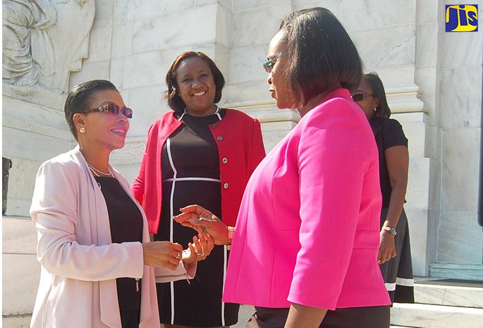 Member of Parliament for East Rural St. Andrew,  and wife of Prime Minister, the Most Hon. Andrew Holness, Mrs.  Juliet Holness, converses with Jamaica’s Ambassador to the United States, Her Excellency Audrey Marks, just before the start of the Caribbean Regional Workshop for Parliamentarians and Policymakers on Cybersecurity, held at the Organization of American States headquarters in Washington, DC.  Mrs. Holness was among several parliamentarians from the Caribbean region who participated in the workshop held from October 17 to 20.  Looking on at centre is the Deputy Chief of Mission, Embassy of Jamaica in Washington, Marsha Coore-Lobban.