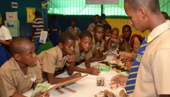 Jonathan Grant High School Student Jared Hopkins (Right), showcases his winning drone entry in the Robotics Competition at a science fair held recently at the Jonathan Grant High School. The science fair was held under the theme: ‘Promoting Holistic Development through STEM Education’.