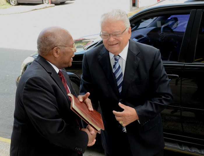 Minister of Industry, Commerce and Agriculture, Hon. Karl Samuda (right), is greeted by Permanent Secretary in the Ministry, Vivian Brown, when he arrived for the first day in office, at the Ministry’s New Kingston location, on March 8. 