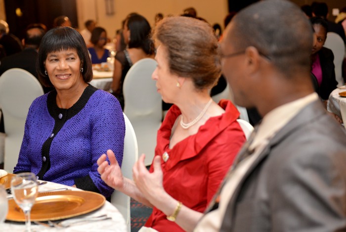 Prime Minister, the Most Hon. Portia Simpson Miller (left), shares a light moment with Her Royal Highness, the Princess Royal, and Minister of State in the Ministry of Foreign Affairs and Foreign Trade, Hon. Arnaldo Brown, during the Caribbean-Canada Emerging Leaders’ Dialogue (CCELD) dinner, held on Thursday (October 1), at the Pegasus Hotel. The CCELD is a programme to build the capacity of Caribbean and Canadian leaders from the business sector, Government and civil society. The Princess Royal is the President of the CCELD.