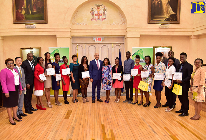 Their Excellencies, Governor-General the Most Hon. Sir Patrick Allen (10th left) and Lady Allen (10th right), along with recipients and sponsors of the Summer of Service awards during the presentation ceremony at King's House on Tuesday (August 21).