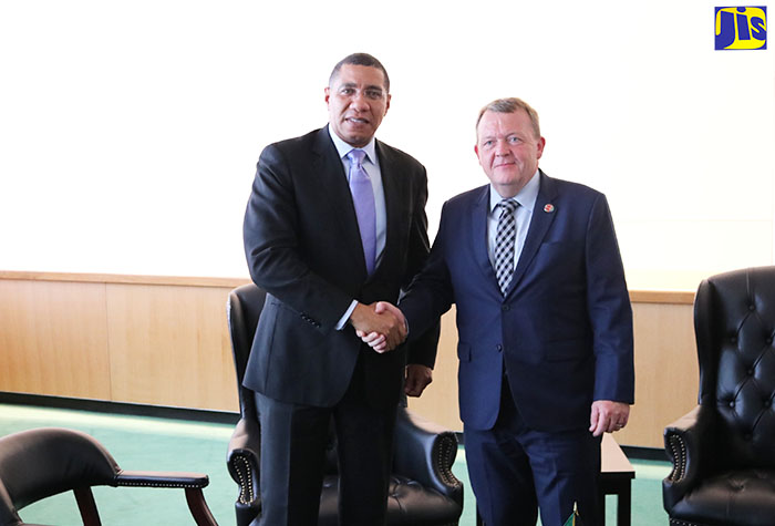 Prime Minister, the Most. Hon. Andrew Holness (left) greets Denmark’s Prime Minister, Lars Lokke Rasmussen, prior to the leaders holding bilateral talks at the United Nations Headquarters in New York on Tuesday (September 25).