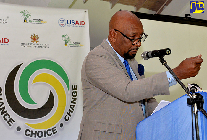 Minister of State in the Ministry of National Security, Hon. Rudyard Spencer, addresses the opening ceremony for the ‘Chance, Choice, Change (Triple C)' Day Camp on Wednesday (September 19) at the Caymanas Golf and Country Club in St. Catherine. The event forms part of the activities for Anti- Gang Week 2018 from September 16 to 21 under the theme ‘Gang Life equals no Life’.  