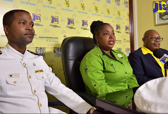 Senior Geographic Information System (GIS) Manager and Trainer at the National Spatial Data Management Division, Simone Lloyd (centre), addresses JIS ‘Think Tank’ on Geography Awareness Week.  With her are representatives from the major sponsors of Geography Awareness Week - Director of the Learning Resources Development Department at the HEART Trust/NTA, Dr. Henry Gray (right); and Associate Vice President of the Faculty of Engineering and Applied Technology at the Caribbean Maritime University, Dr. Stephen Rhoden.
