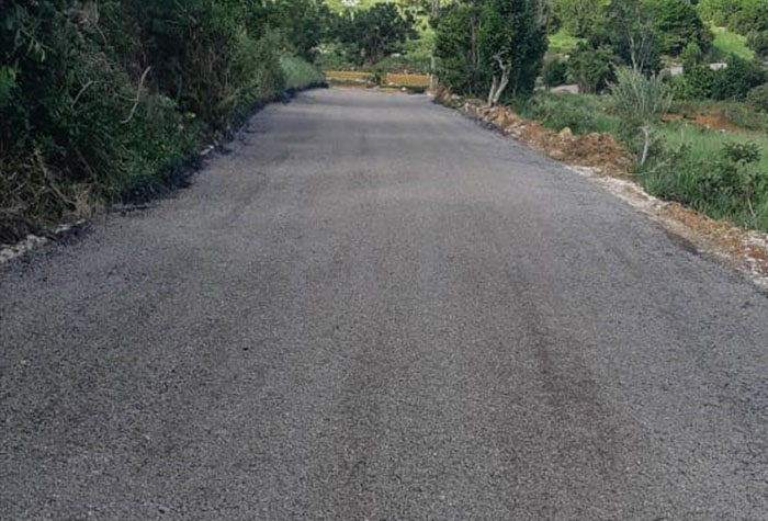 The Halifax road in Manchester after work was completed under the National Farm Road Rehabilitation Programme.