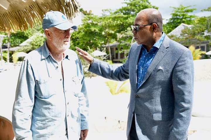 Minister of Tourism, Hon. Edmund Bartlett (right), has the undivided attention of Businessman, Christopher Blackwell, at the recent launch of the new James Bond movie in Oracabessa, St. Mary, slated for a 2020 release. Segments will be filmed in Jamaica.