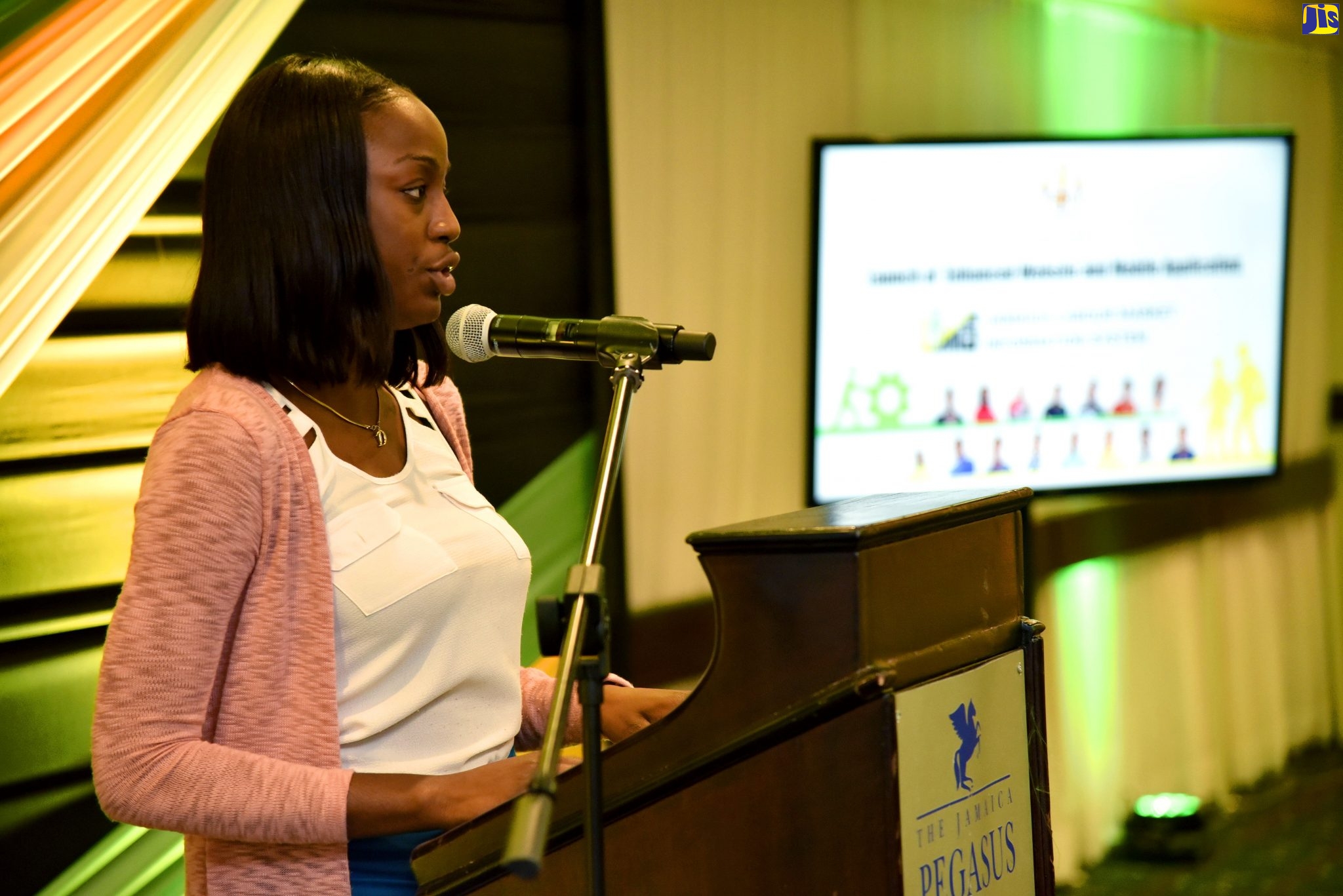 Human Resource Specialist at IBEX Global Jamaica, Daysia-Gay White, addresses the launch of the Ministry of Labour and Social Security’s Labour Market Information System (LMIS) Mobile Application, at The Jamaica Pegasus hotel in New Kingston, recently.