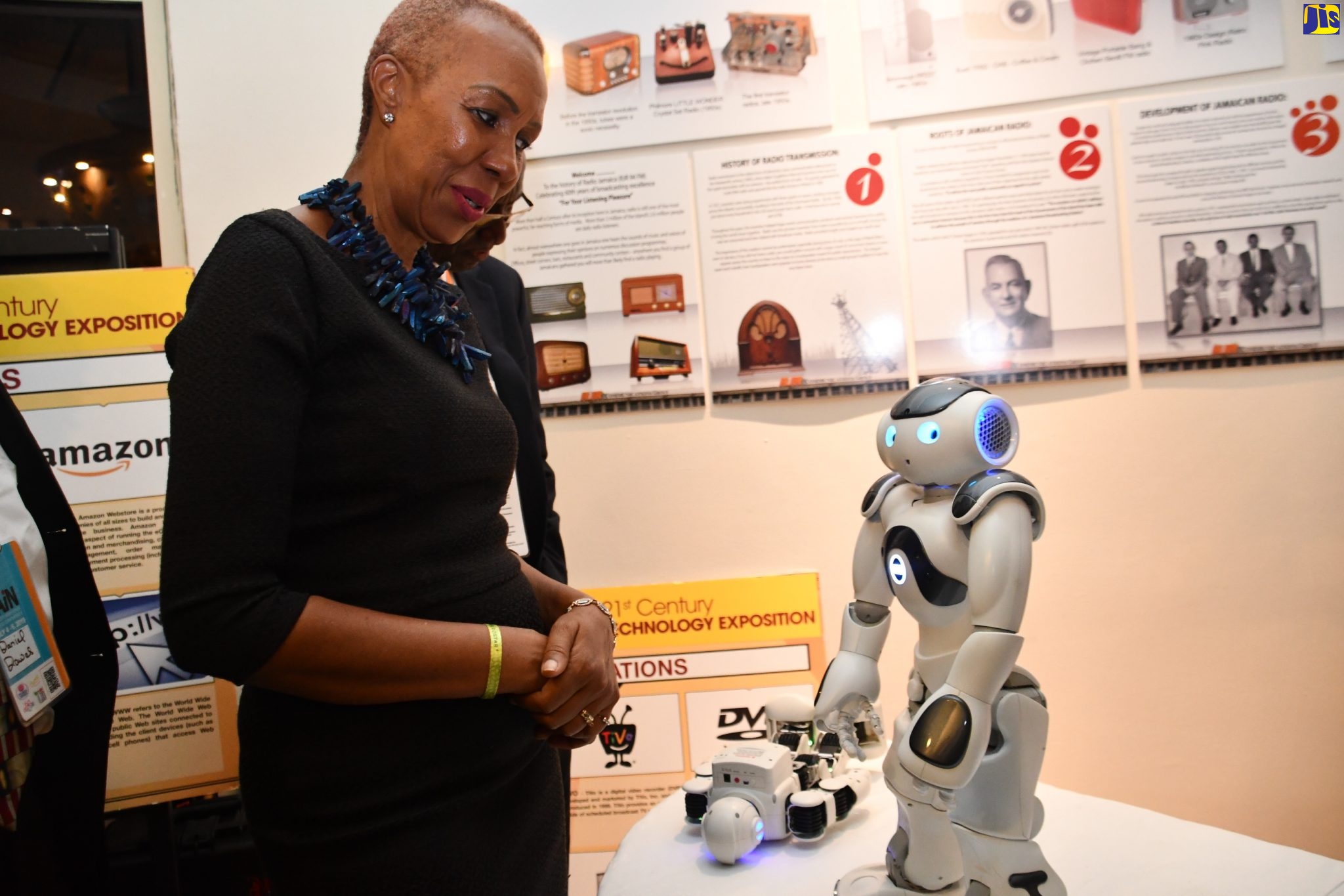 Minister of Science, Energy and Technology, Hon. Fayval Williams, interacts with ‘Bob’ the robot at the Northern Caribbean University (NCU) booth, during the Global Adventist Internet Network (GAIN) Conference at the Iberostar Rose Hall Beach Hotel in Montego Bay, St. James, on July 4.