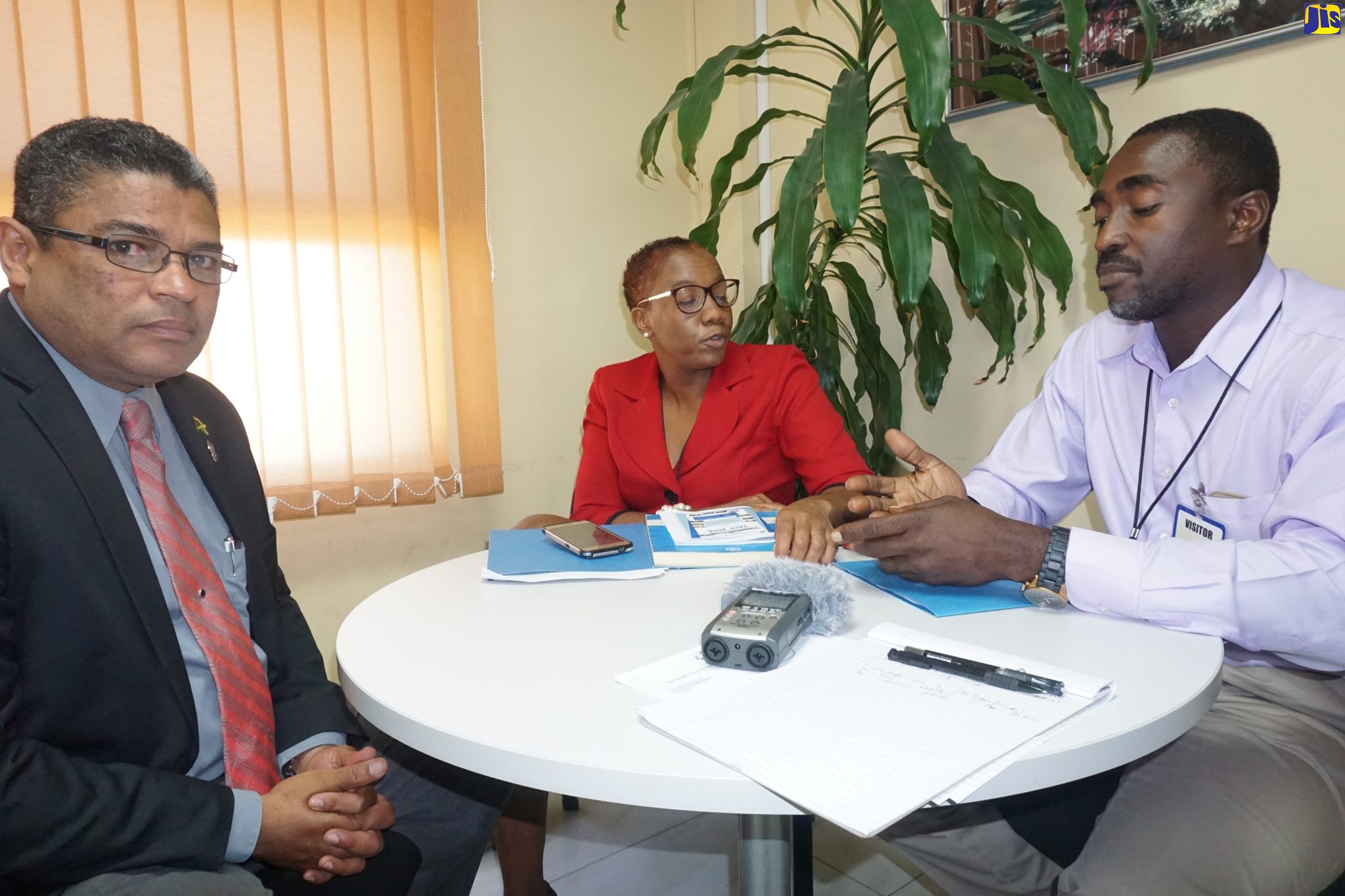 Managing Director of the Water Resources Authority (WRA), Peter Clarke (left); Senior Librarian and Acting Public Education Officer at the WRA, Roshelle Archer-James, and Senior Hydrogeologist at the WRA, Kevin Chambers, in an interview session with JIS News.