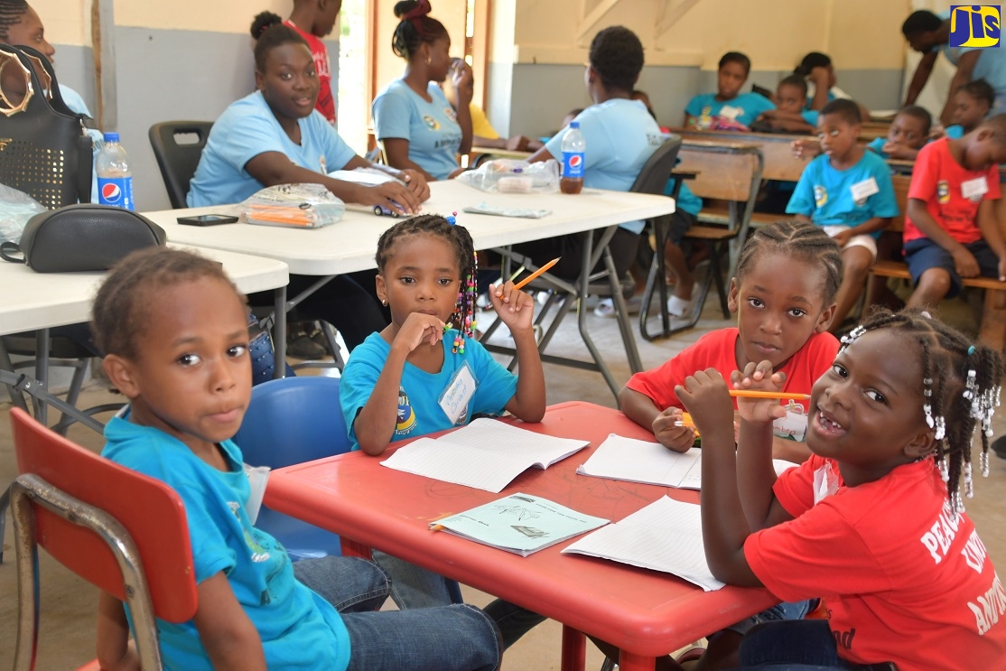 Youngsters in attendance at the Jamaica Constabulary Force’s (JCF) four-week children’s summer camp in Salt Spring, St. James. Some 120 children benefited from the initiative.

