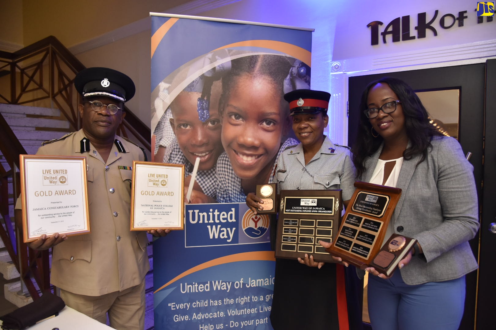 Assistant Commissioner of Police (ACP) Gary Welsh (left), along with Woman Sergeant Tanya Layne (centre) and Woman Inspector Barbara Robinson, display awards which the Jamaica Constabulary Force (JCF) and several of its members received at the United Way of Jamaica (UWJ) Nation Builders’ and Employees Awards ceremony, held recently at the Jamaica Pegasus Hotel in New Kingston.