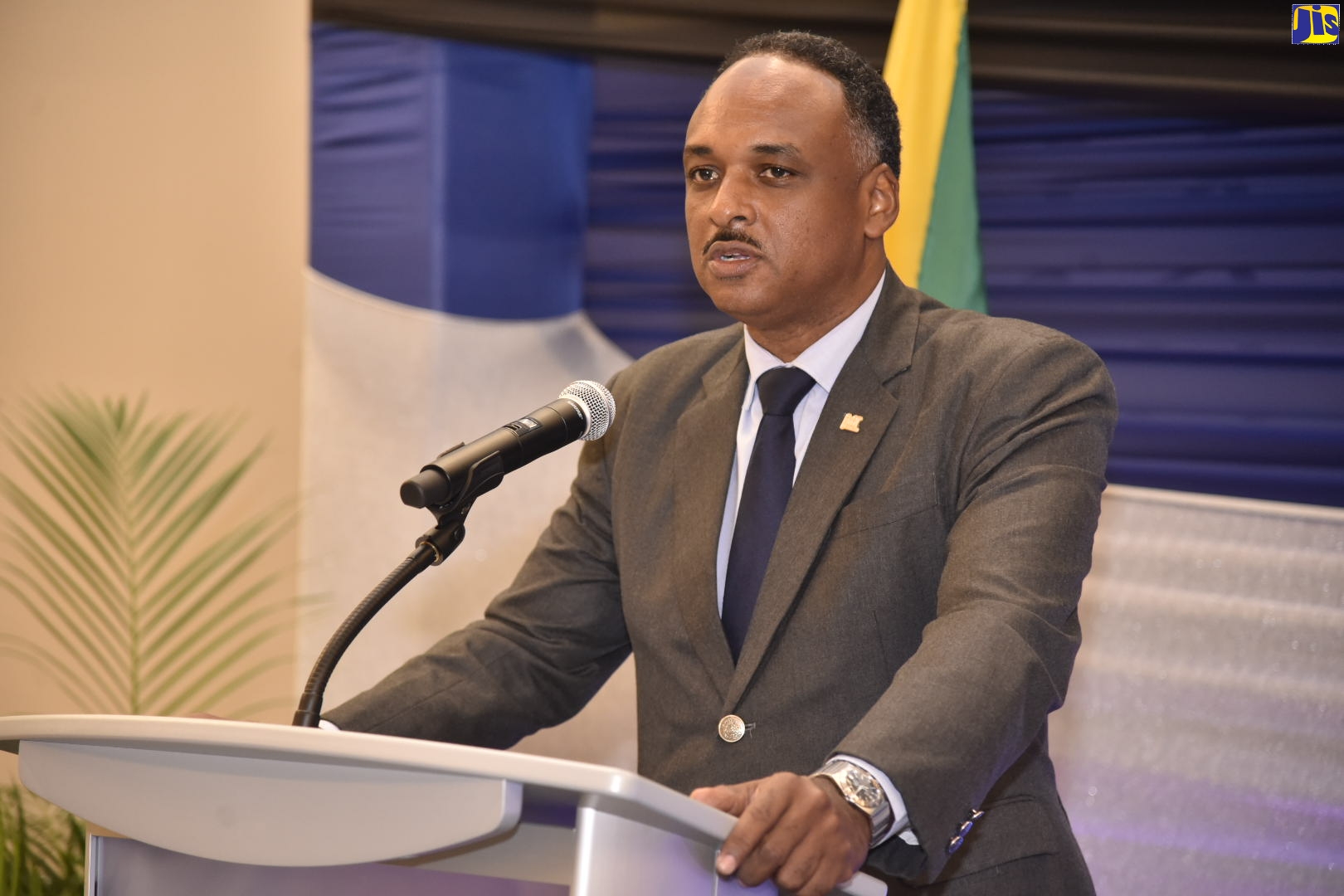 Managing Director of the Jamaica Social Investment Fund (JSIF), Omar Sweeney, speaks at the graduation ceremony for the CAC 2000 Foundation/JSIF Air Conditioning Technicians Training Programme, held at the AC Hotel, in Kingston, on Thursday (September 12).