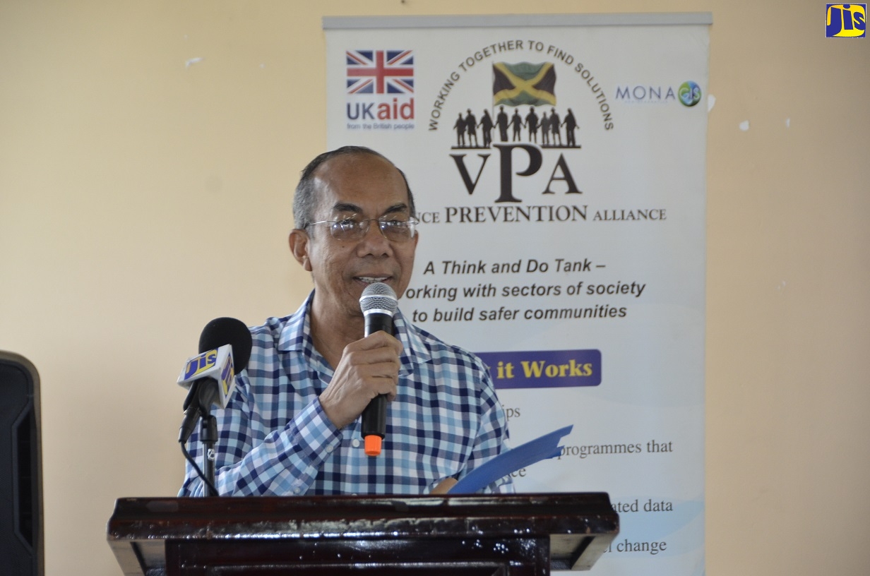 Minster of National Security, Hon. Dr. Horace Chang, speaks at a Violence Prevention and Peace Building Symposium, hosted by the Violence Prevention Alliance (VPA), in partnership with the Ministry of National Security, at the Montego Bay Community College, St. James, on September 26.