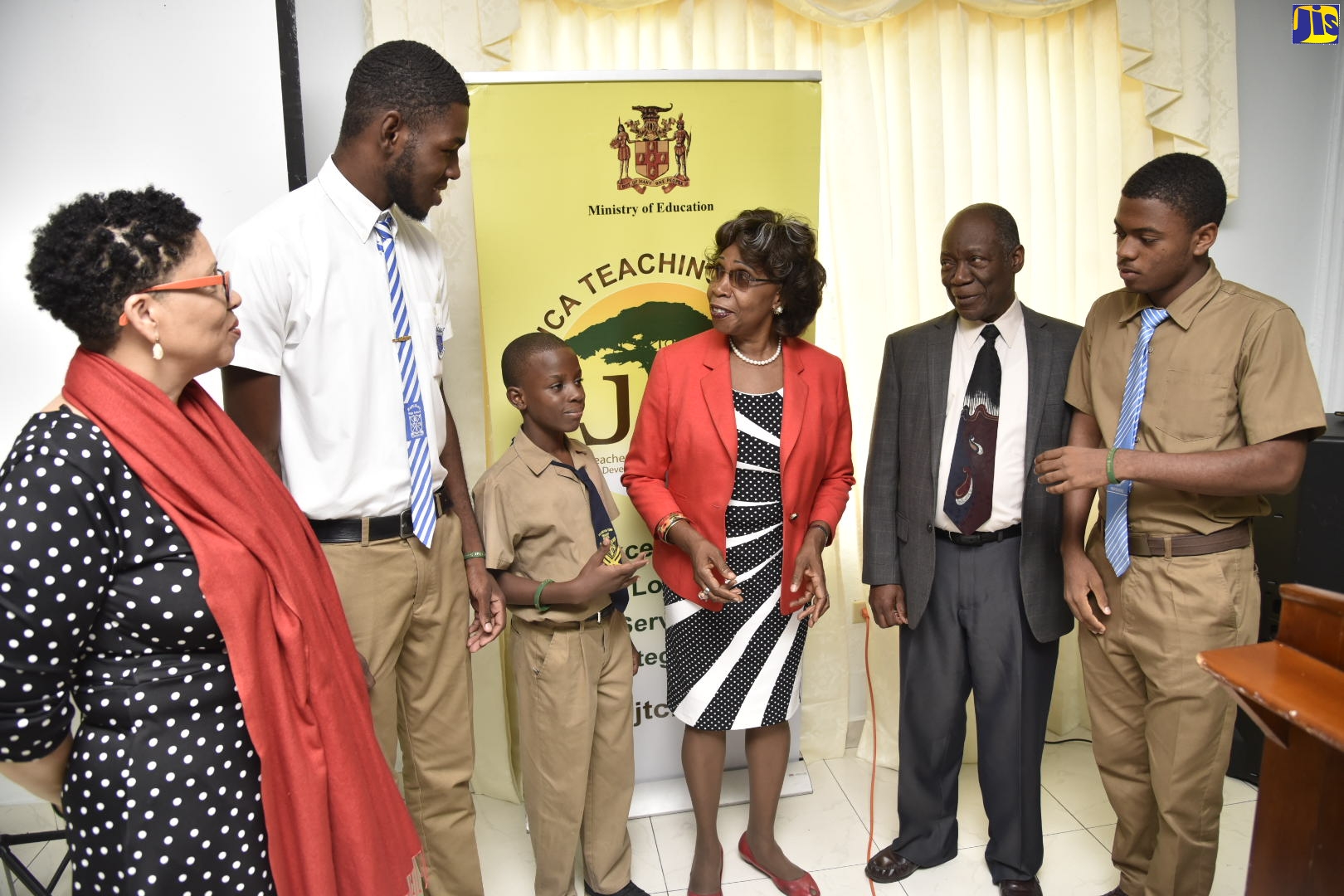 Chief Executive Officer, Jamaica Teaching Council, Dr. Winsome Gordon (centre), speaks with (from left) LASCO Teacher of the Year 2017, Ingrid Peart-Wilmot; Student, Buff Bay High School, Raymond Richards; Student, Rollington Town Primary School, Amaad Allen; Founder, Collaborate to Educate our Sons, Dr. Bertram Melbourne; and Student, Greater Portmore High School, Antione Foster, during the mentorship session for the Boys Education Empowerment Programme, at Medallion Hall Hotel in St. Andrew, on Friday (September 20).