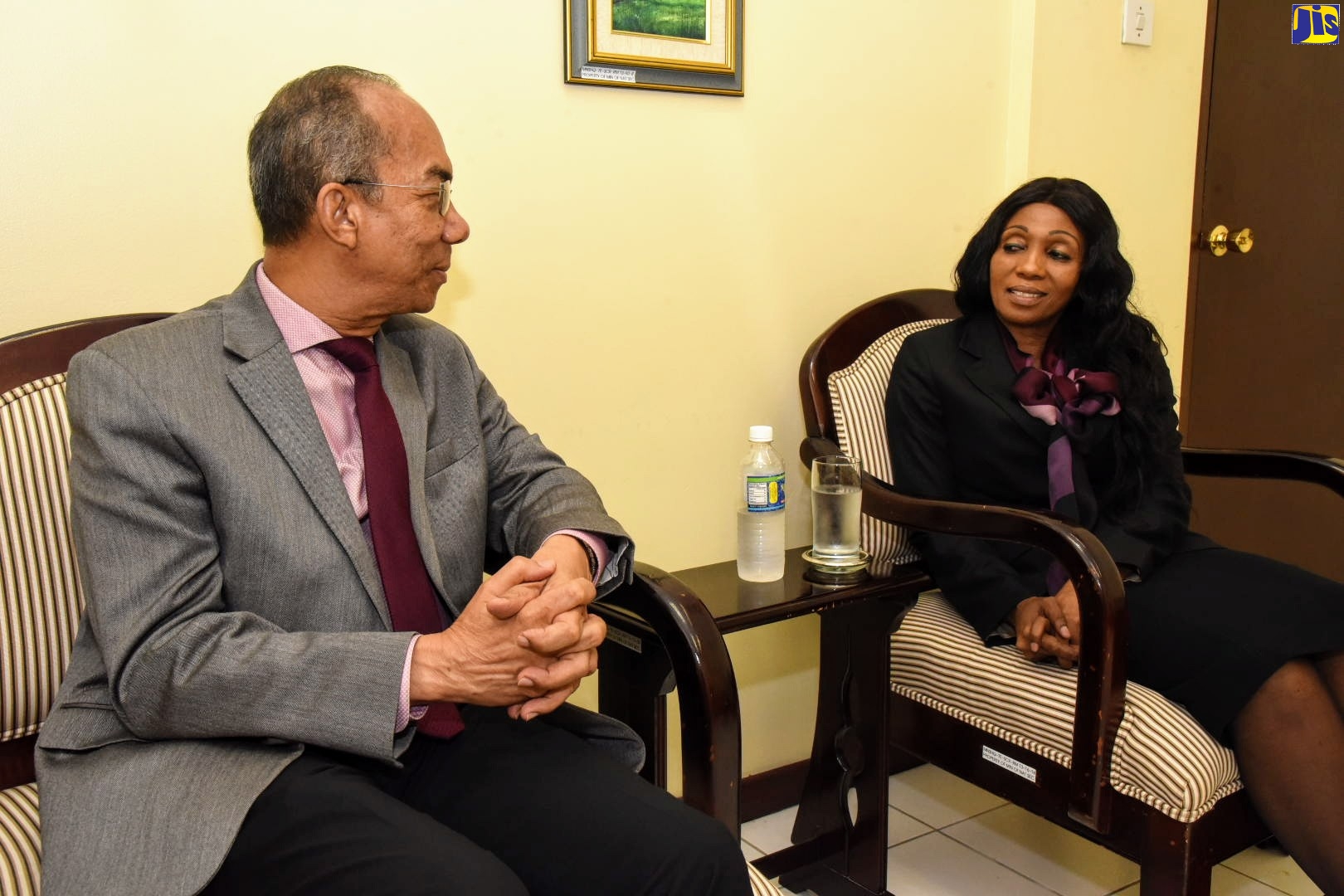 Minister of National Security, Hon. Dr. Horace Chang (left), in discussion with the High Commissioner of the Republic of South Africa in Jamaica, Her Excellency Lumka Yengeni, during a courtesy call at the Ministry, on Thursday (September 12).