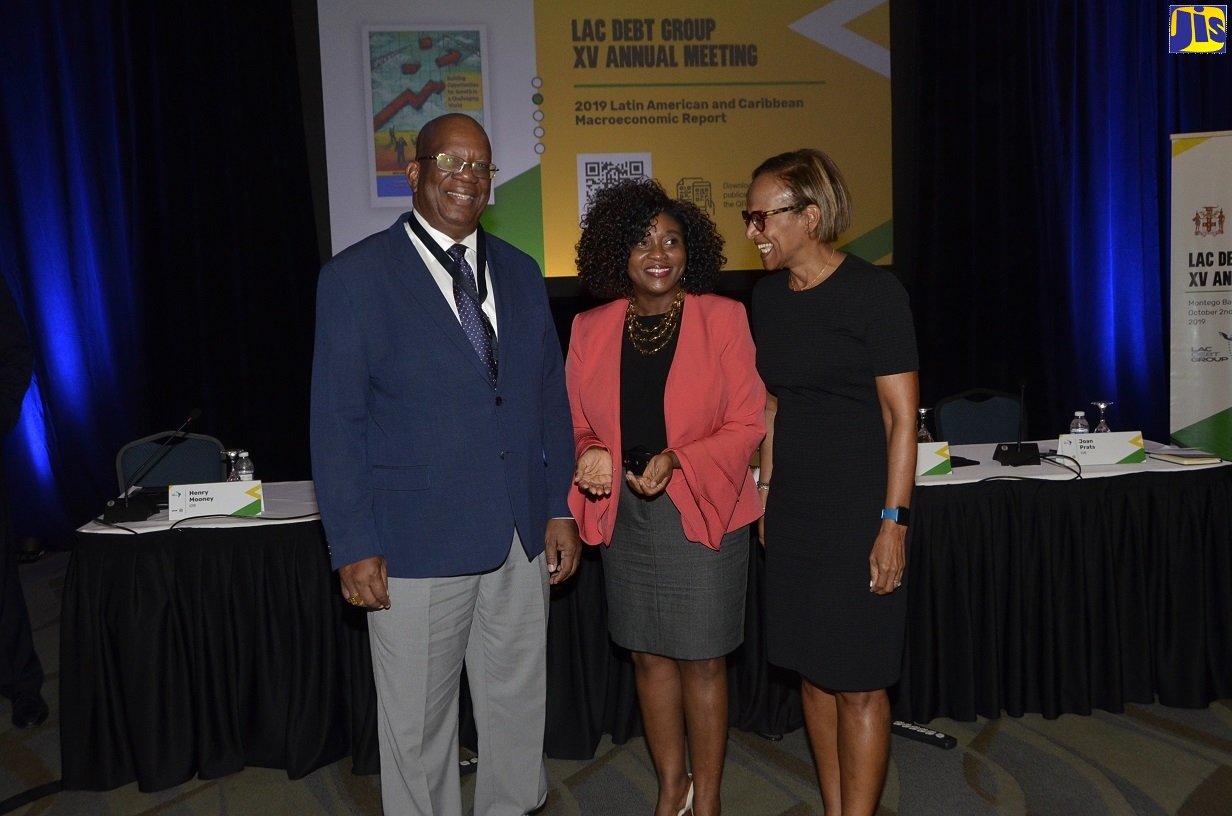 Inter-American Development Bank (IDB) Caribbean Country Group General Manager, Therese Turner Jones (right), shares a moment with Guyana’s Minister of Finance, Hon. Winston Jordan (left); and Principal Director for the Debt Management Branch in the Ministry of Finance and the Public Service, Dian Black, during the Inaugural Caribbean Debt Summit at Secret Resorts in Montego Bay, St. James, on Tuesday (October 1).