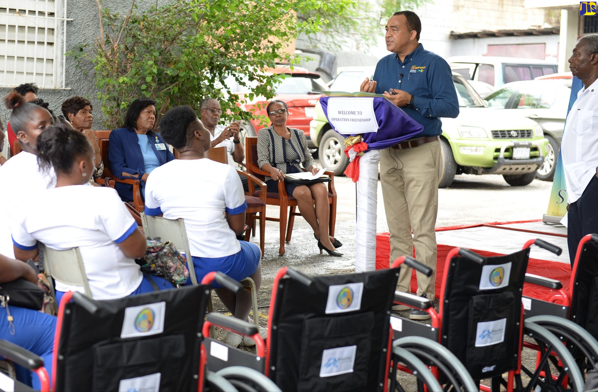 Health and Wellness Minister, Dr. the Hon. Christopher Tufton, speaks at the handover ceremony for wheelchairs donated to the Kingston Public Hospital and the Ministry by the Wheelchair Foundation, through local partners, the Rotary Club of St. Andrew and Operation Friendship, on September 26, at the hospital.