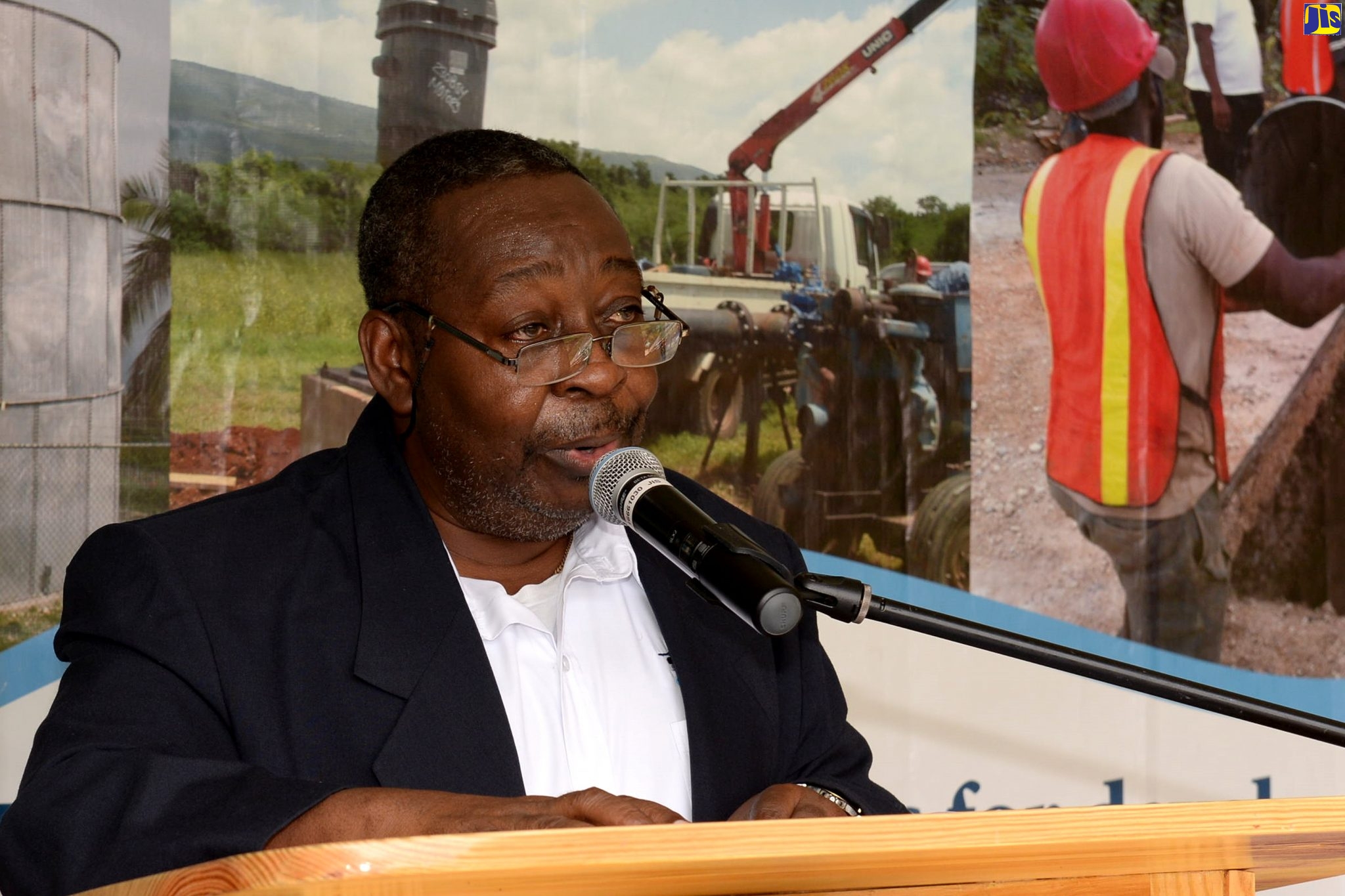 (FILE) Rural Water Supply Limited (RWSL) Managing Director, Audley Thompson, speaking at the recent commissioning ceremony for a $7 million rainwater harvesting system installed at Enid Bennett High School in St. Catherine.