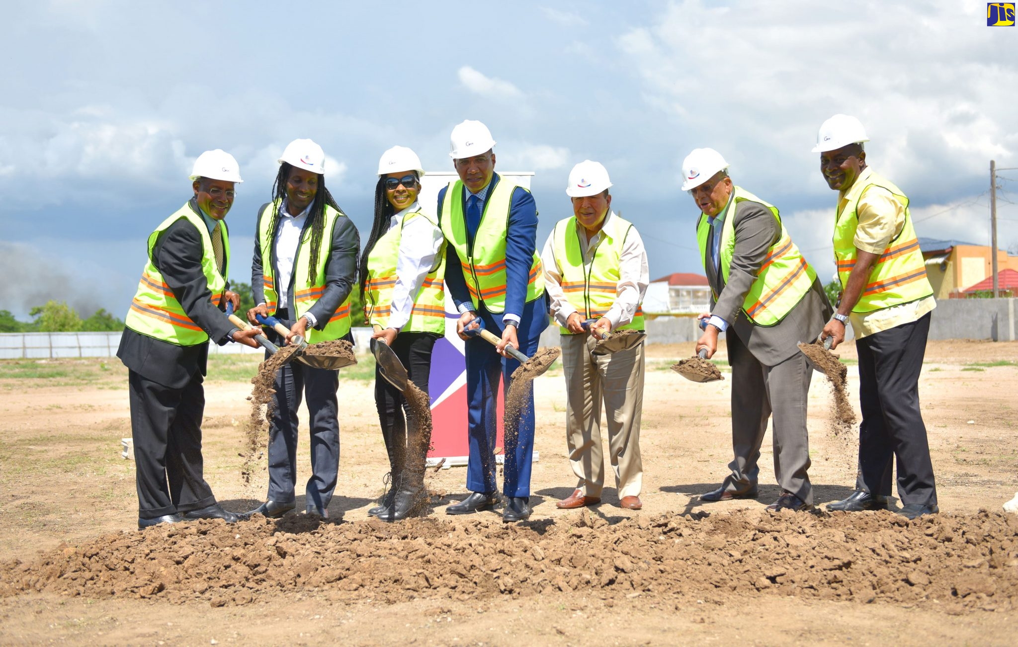 Prime Minister, the Most Hon. Andrew Holness (centre), breaks ground for the $3.5-billion business process outsourcing (BPO) complex, GTECH Park, in Cookspen, Portmore, on Thursday (October 24). Others (from left) are Executive Director of the Economic Growth Council, Senator Aubyn Hill; State Minister in the Ministry of Education, Youth and Information and Member of Parliament for East Central St. Catherine, Hon. Alando Terrelonge; Chief Executive Officer (CEO), Strength Construction Limited, Carelene Bailey; CEO, Portmore Holdings, Gordon Tewani; Leader of the Opposition, Dr. Peter Phillips; and Mayor of Portmore, Councillor Leon Thomas.