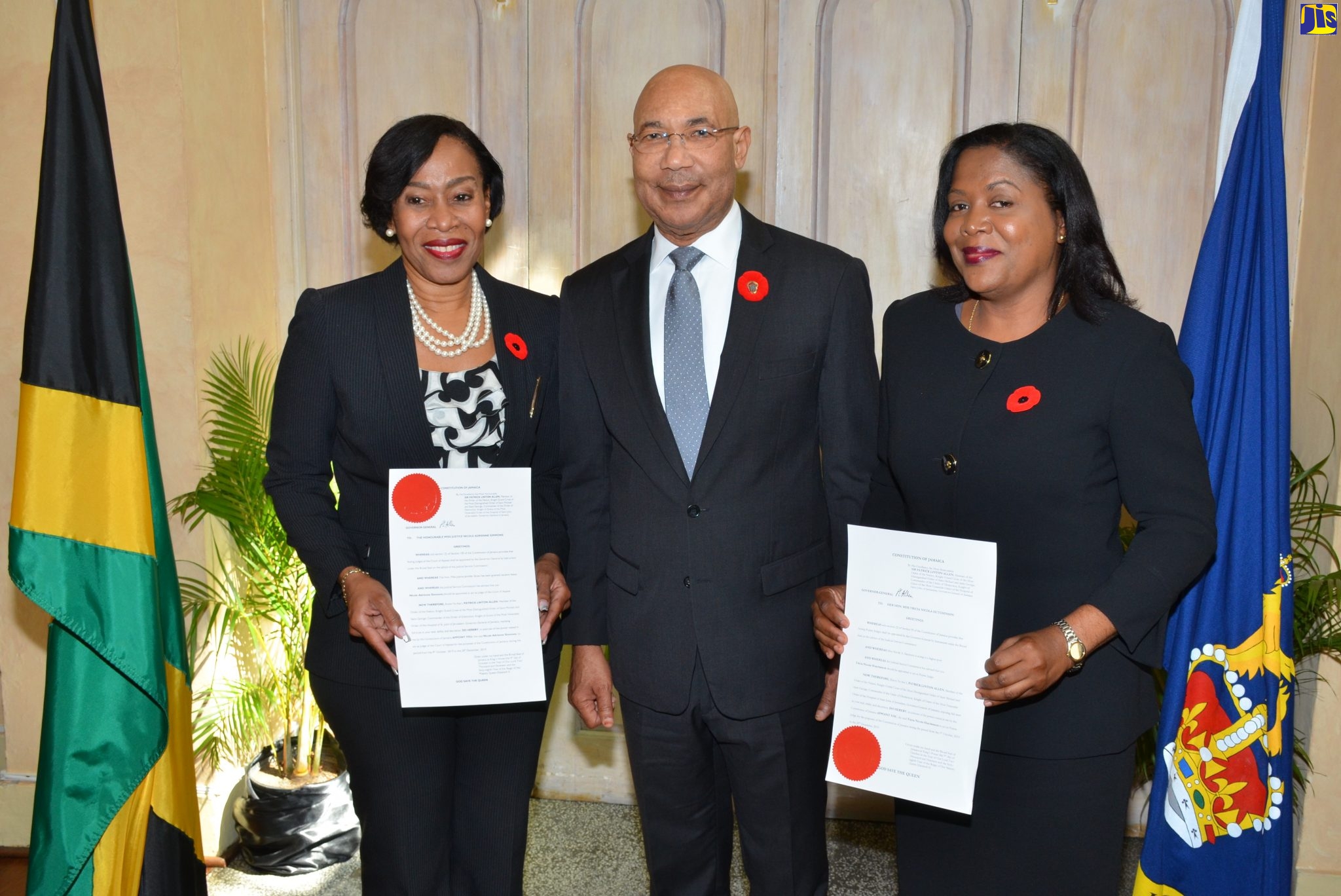 Governor-General, His Excellency the Most Hon. Sir Patrick Allen, flanked by the two newly appointed high court judges, Acting Court of Appeal Judge, Justice Nicole Simmons (left) and Acting Puisne Judge, Justice Tricia Hutchinson, during a swearing-in ceremony at King’s House in St. Andrew on Wednesday (October 9).