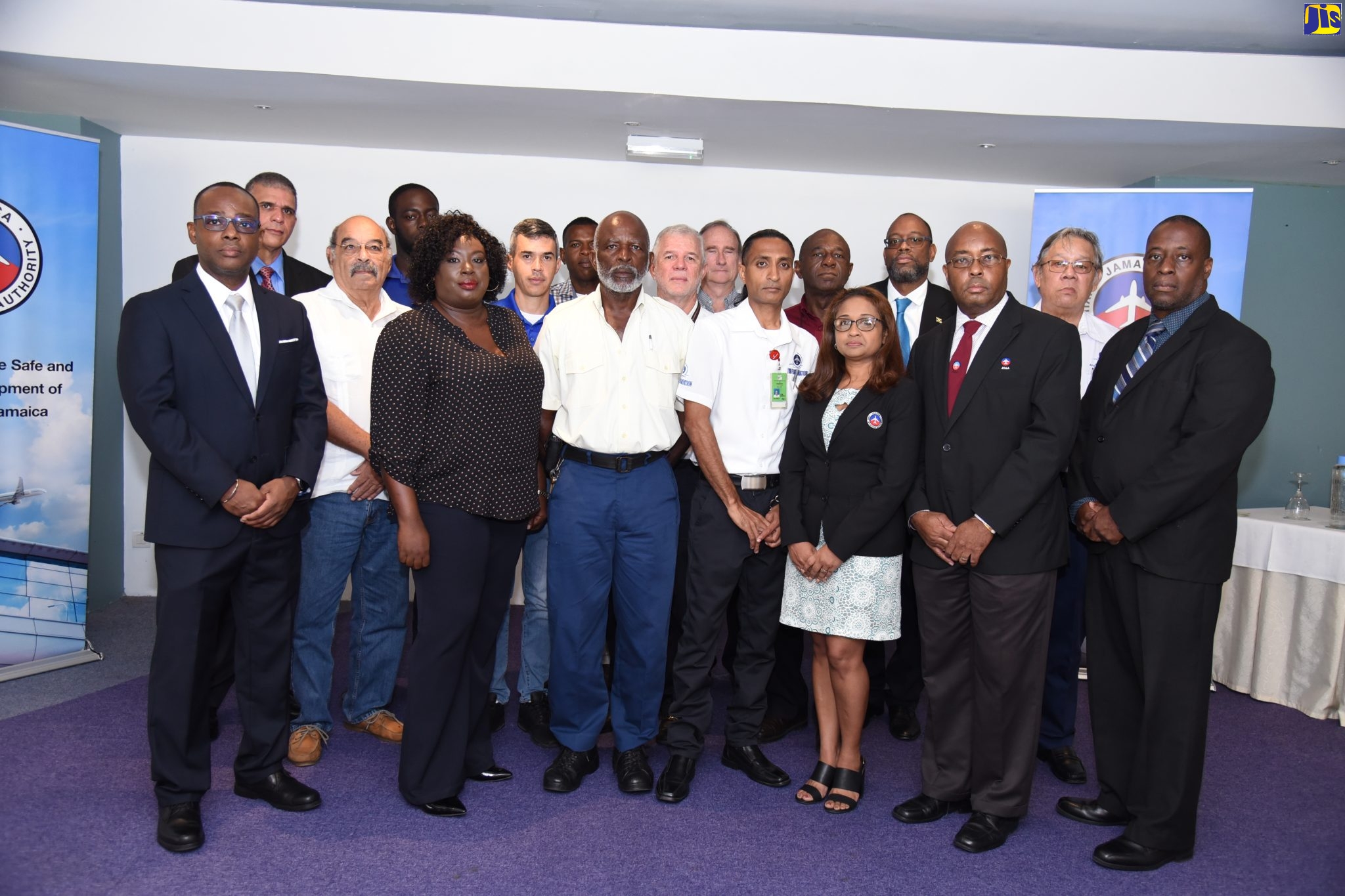 Deputy Director General, Regulatory Affairs, Jamaica Civil Aviation Authority (JCAA), Rohan Campbell (front left) with participants in the JCAA Aviation Quality System Seminar held on Friday (Nov. 8) at the Iberostar Resort in Montego Bay, St. James.
