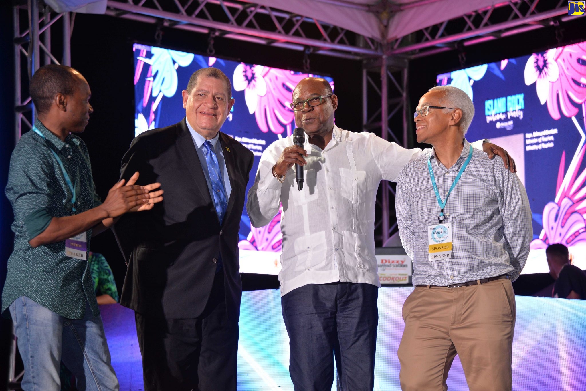 Minister of Tourism, Hon Edmund Bartlett (second right), enjoys a light moment with (from left) Chairman of the Caribbean Tourism Organization (CTO) and Minister of Tourism for St Lucia, Dominique Fedee; Minister of Industry, Commerce, Agriculture and Fisheries, Hon Audley Shaw; and Minister of Tourism for The Bahamas, Dionisio D’Aguilar. Occasion was a cocktail reception for the Caribbean Hotel Investment Conference and Operations Summit (CHICOS) in Montego Bay on Wednesday night (November13).