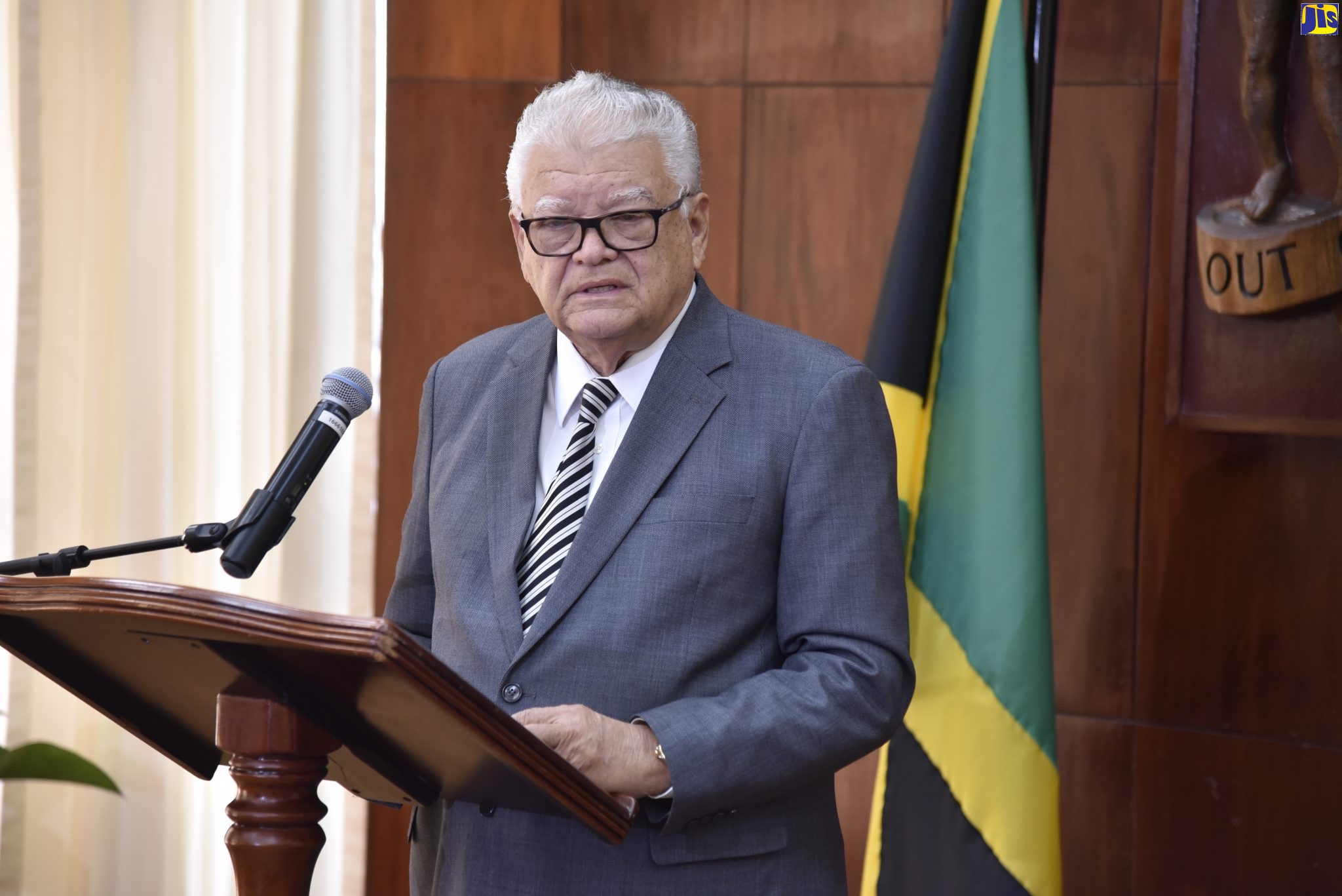 Minister without Portfolio with responsibility for Education, Youth and Information, Hon. Karl Samuda, addresses yesterday