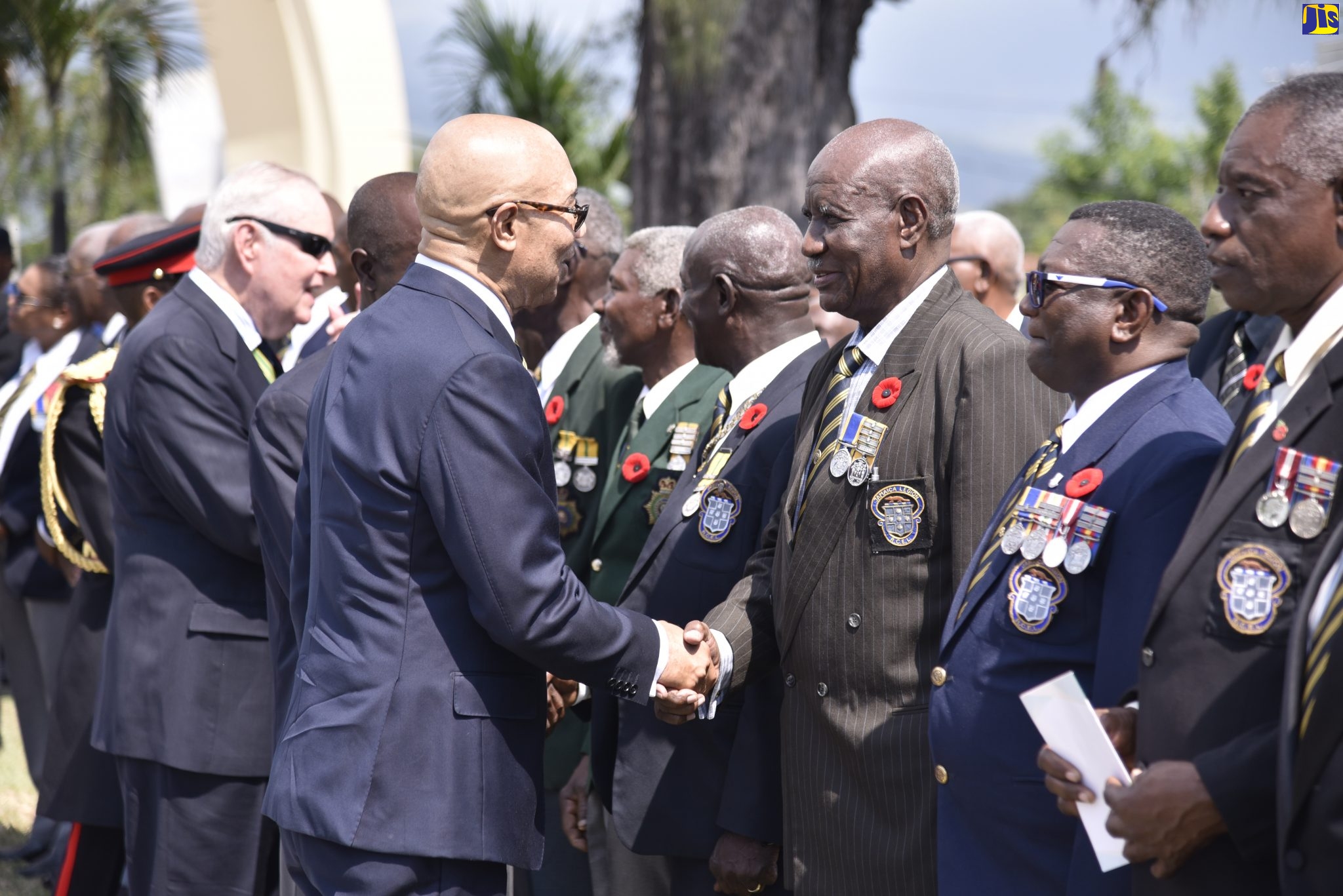 Governor-General, His Excellency, the Most Hon. Sir Patrick Allen (left), greeting former World War II servicemen and servicewomen at the Remembrance Day ceremony held at National Heroes Park in Kingston on November 10. Traditionally, Remembrance Day, also known as Armistice Day or Poppy Day is observed on the second Sunday in November, and its primary purpose is to pay homage to those who gave their service and, ultimately, their lives in the two great wars.