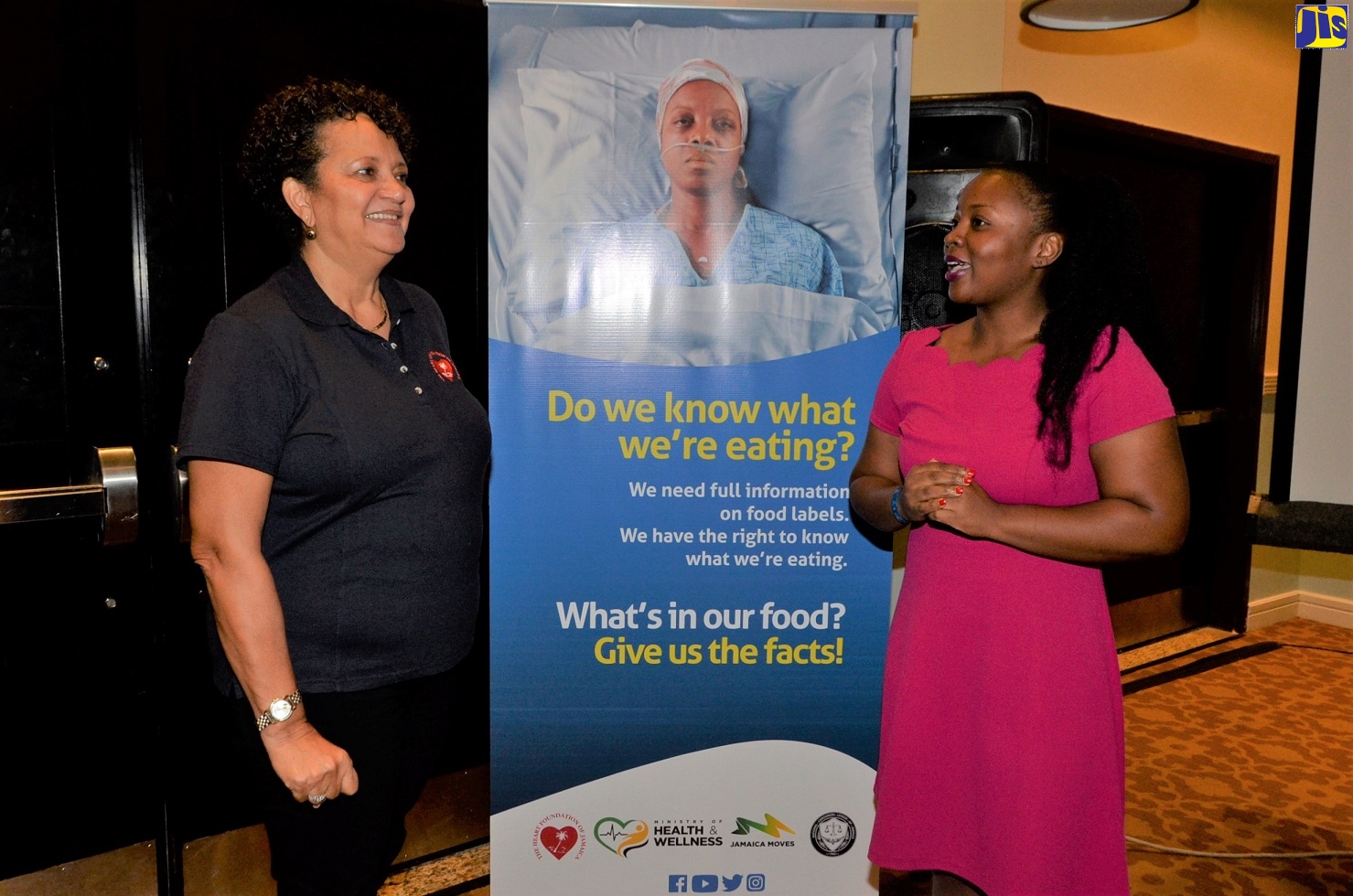 Senior Standards and Certification Officer at the Bureau of Standards Jamaica (BSJ), Phillipa O’Connor (right), converses with Project Manager for the Heart Foundation of Jamaica’s (HFJ) Global Health Advocacy Project, Barbara McGaw, at a stakeholder forum on front of package nutrition labelling in Jamaica, hosted by the HFJ, at the Hilton Rose Hall, Montego Bay on Thursday (Nov. 21). 