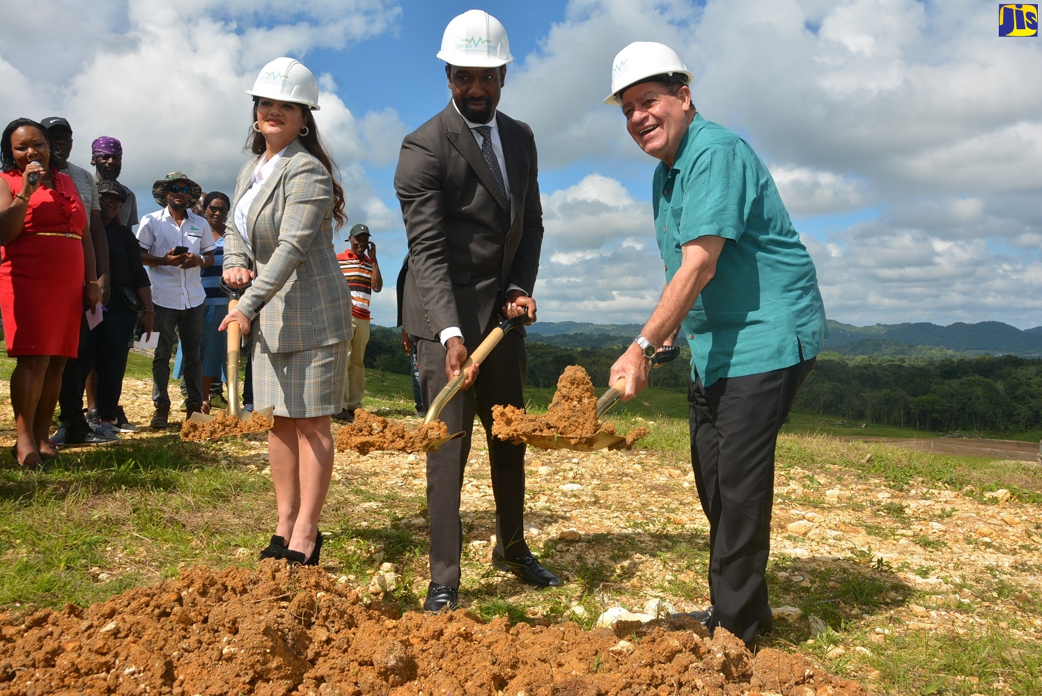 Minister of Industry, Commerce, Agriculture and Fisheries, Hon. Audley Shaw (right), joins Virtudes Company Limited’s Chief Operating Officer, Farrah Zaragan (left), and the company
