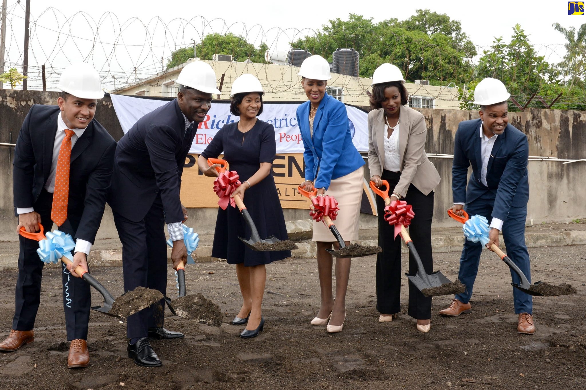 Minister of Science, Energy and Technology, Hon. Fayval Williams (third right) breaks ground for construction of FosRich Company Limited’s warehouse facility and distribution centre at 76 Molynes Road in Kingston on Tuesday (November 19). Also breaking ground (from left) are FosRich Shareholder Representative, Matthew Williams; Chief Executive Officer, FosRich, Cecil Foster; Board Chairman, FosRich, Marion Foster; Trustee, GK Pension Scheme, Terry-Ann Graver; and Managing Director, GW Architects, Garfield Wood. 