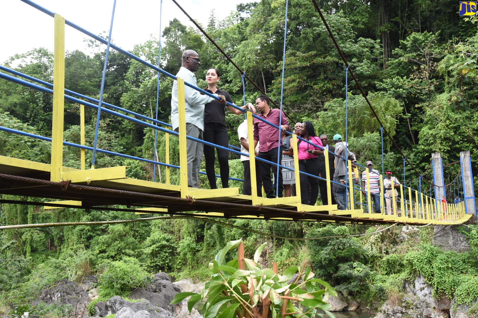 Minister of Local Government and Community Development, Hon. Desmond McKenzie (left), and Member of Parliament for Eastern Portland, Ann-Marie Vaz (second left), are in discussion following the official opening of a $7.1-million swing bridge in the community of Ginger House, Portland, on Wednesday (November 6).