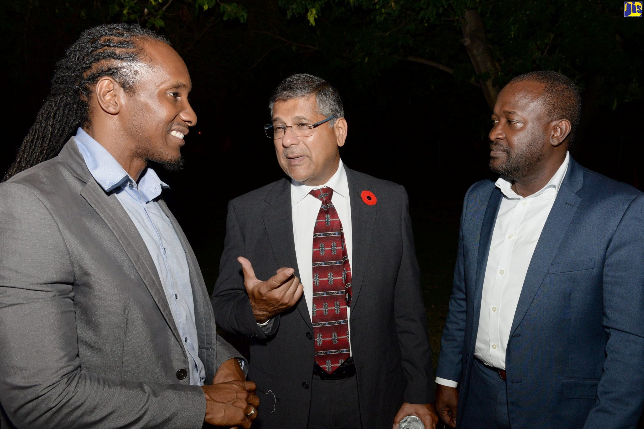 State Minister in the Ministry of Education, Youth and Information, Hon. Alando Terrelonge (left), is in conversation with British High Commissioner to Jamaica, His Excellency Asif Ahmad (centre); and HEART Trust/NTA Chairman, Edward Gabbidon, at the official launch of the ‘Get Hired’ Programme at the British High Commissioner’s Residence in Kingston on November 7.