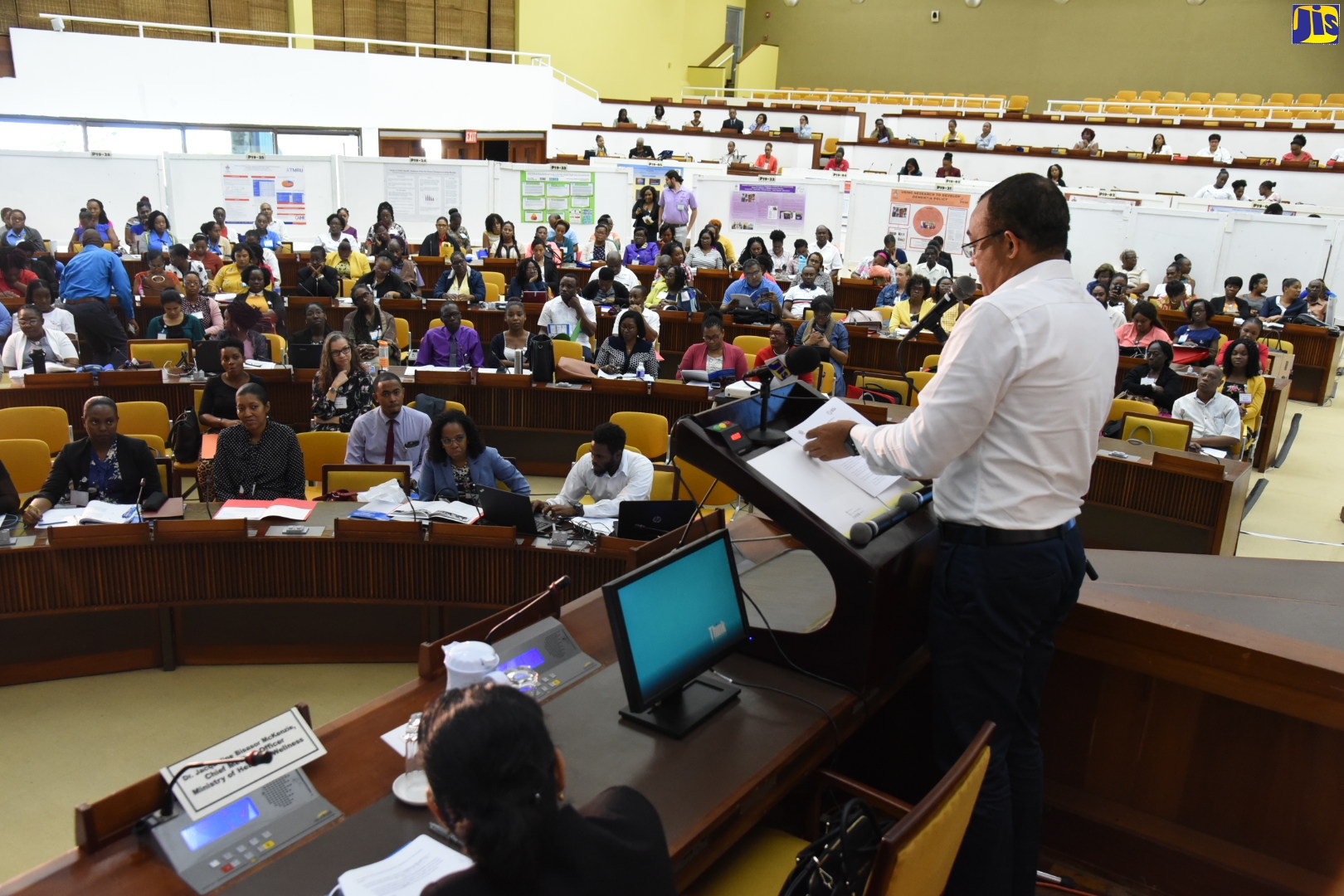 Minister of Health and Wellness, Dr. the Hon. Christopher Tufton (at podium), addresses the opening of the 10th Annual National Health Research Conference at the Jamaica Conference Centre in downtown Kingston on Thursday (November 21).
