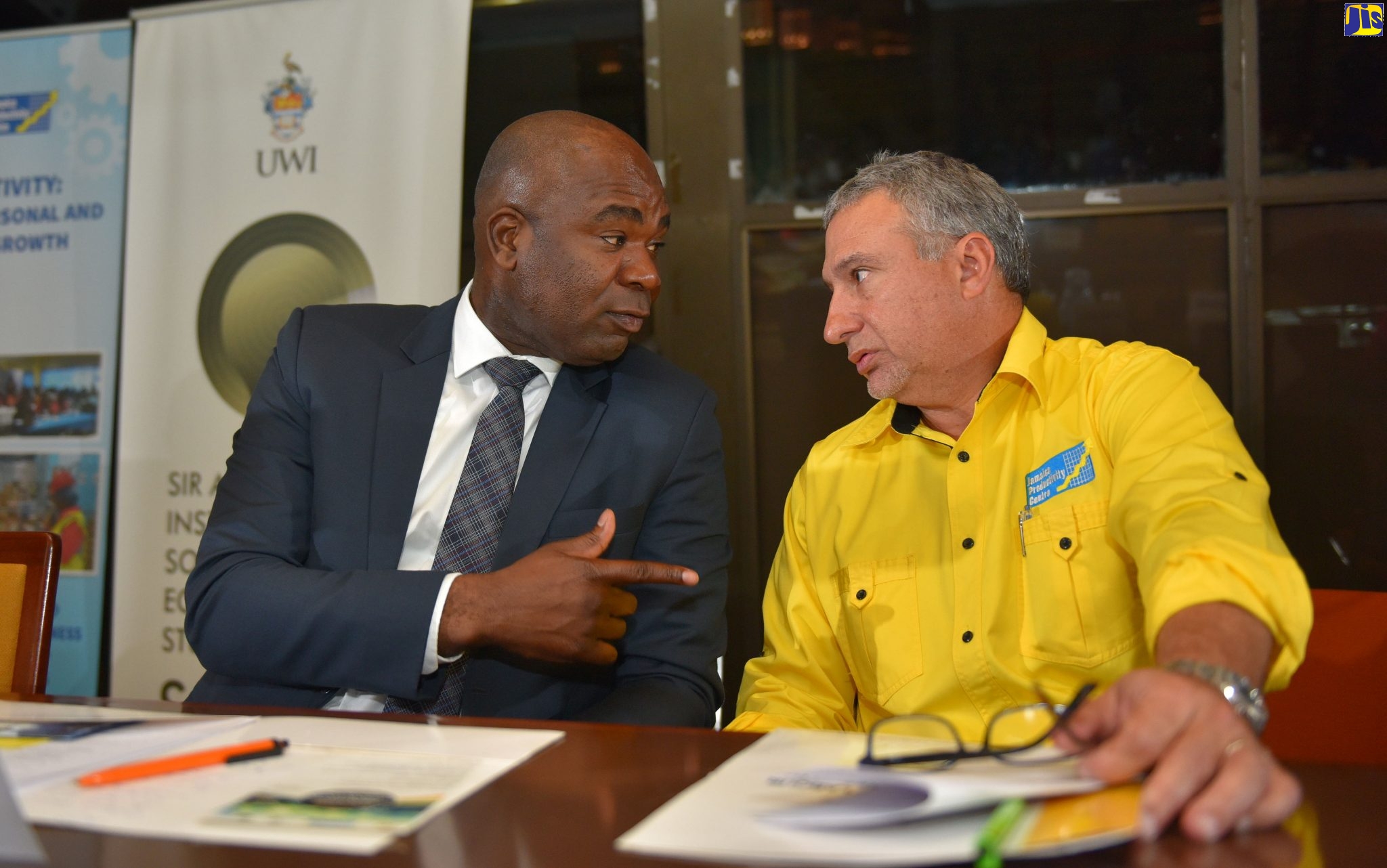 Minister of State in the Ministry of Labour and Social Security, Hon. Zavia Mayne (left), converses with Board Chairman, Jamaica Productivity Centre, Metry Seaga, during the National Youth Workshop at the Jamaica Conference Centre, in downtown Kingston, on November 21. The workshop, held under the theme: ‘Future Work: Realising Productivity Growth’, was organised by the Jamaica Productivity Centre, in partnership with the Sir Arthur Lewis Institute for Social and Economic Studies (SALISES).