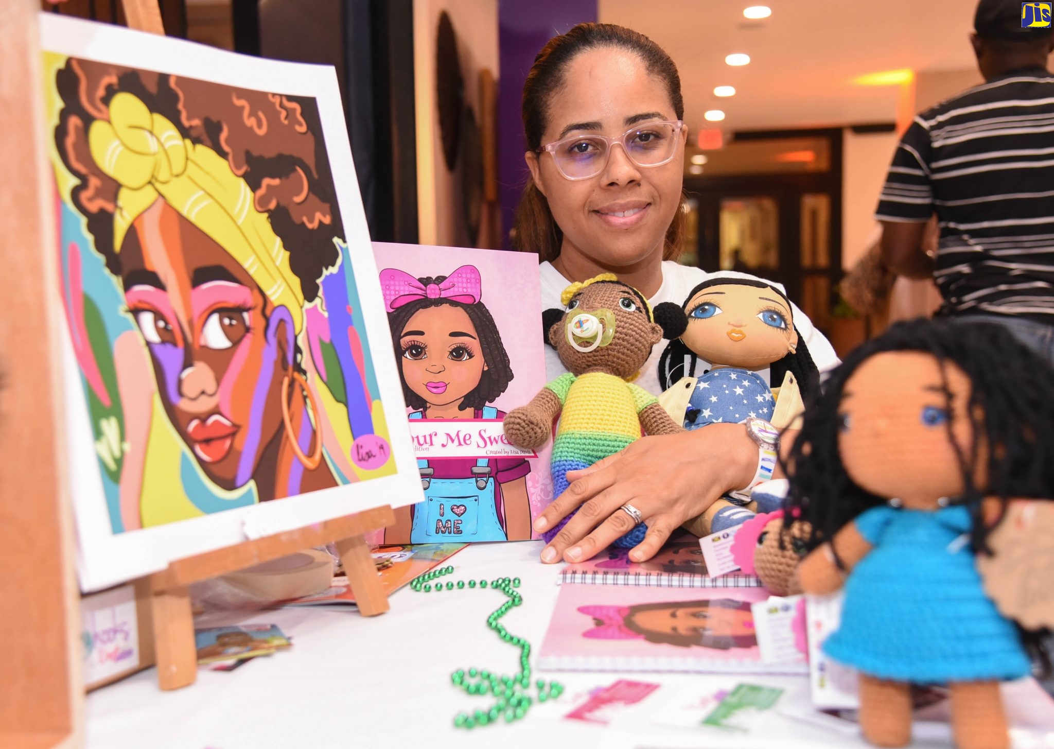Entrepreneur, Lisa Davis, displays her range of products at a Jamaica Business Development Corporation (JBDC) expo earlier this year.