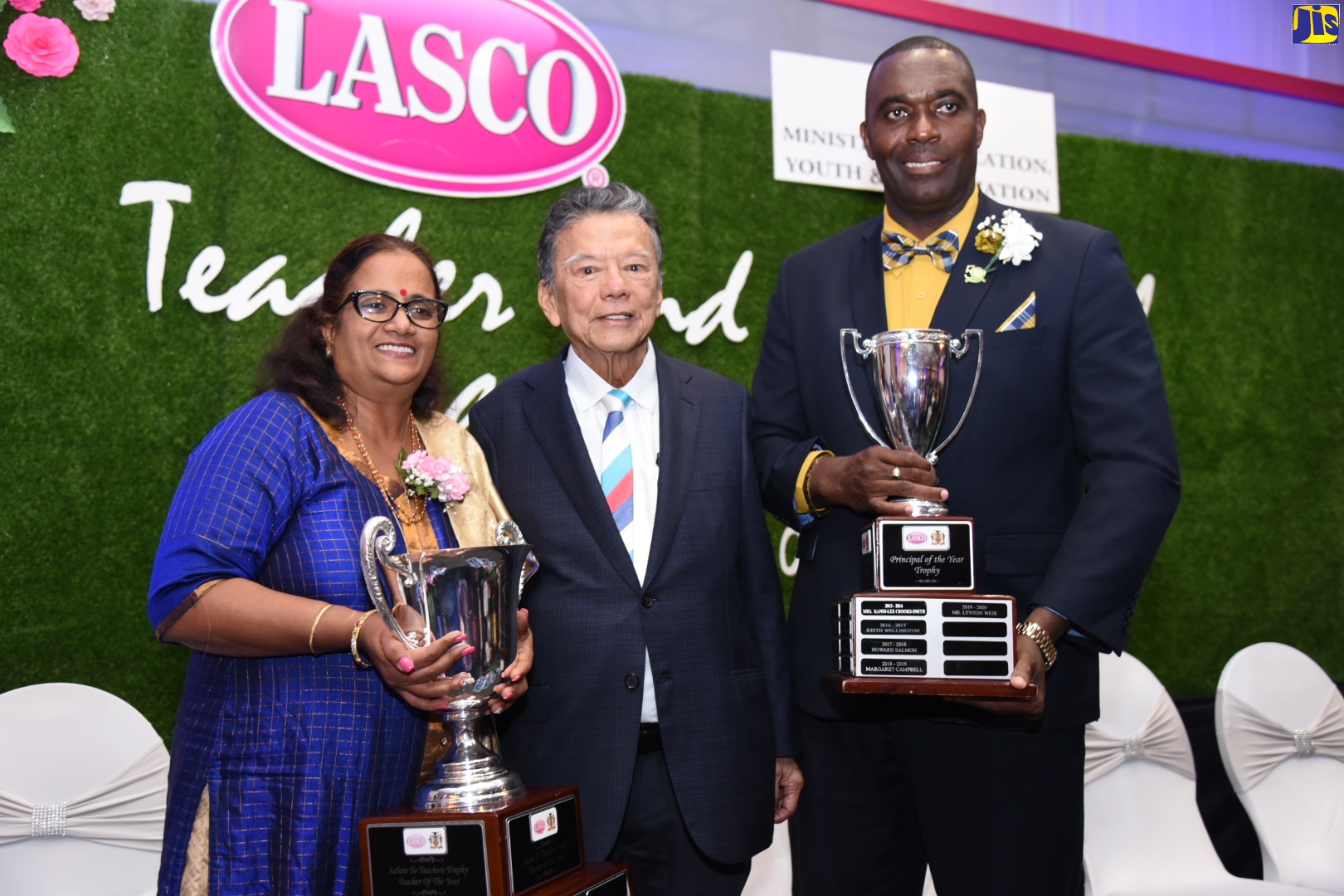 Founder and Executive Chairman, LASCO Affiliated Companies, Lascelles Chin (centre), shares a moment with Old Harbour High School Principal, Lynton Weir (right), and Bhagya Malladi of Immaculate Conception High School, who copped the LASCO/Ministry of Education, Youth and Information 2019/20 Principal and Teacher of the Year awards, respectively. Occasion was the awards ceremony, held at The Jamaica Pegasus in New Kingston on Tuesday (December 2).