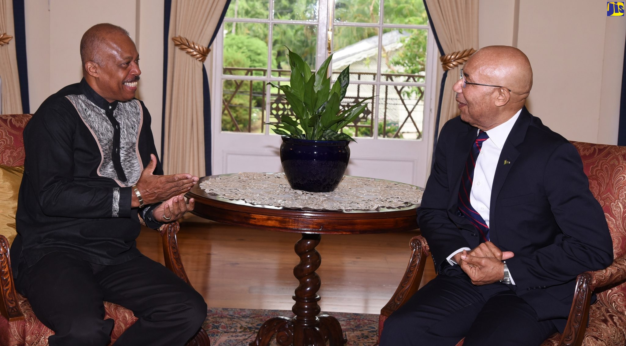 Governor-General, His Excellency the Most Hon. Sir Patrick Allen (right), converses with Vice Chancellor, University of the West Indies, Mona, Sir Hilary Beckles, when he called at King’s House, recently.