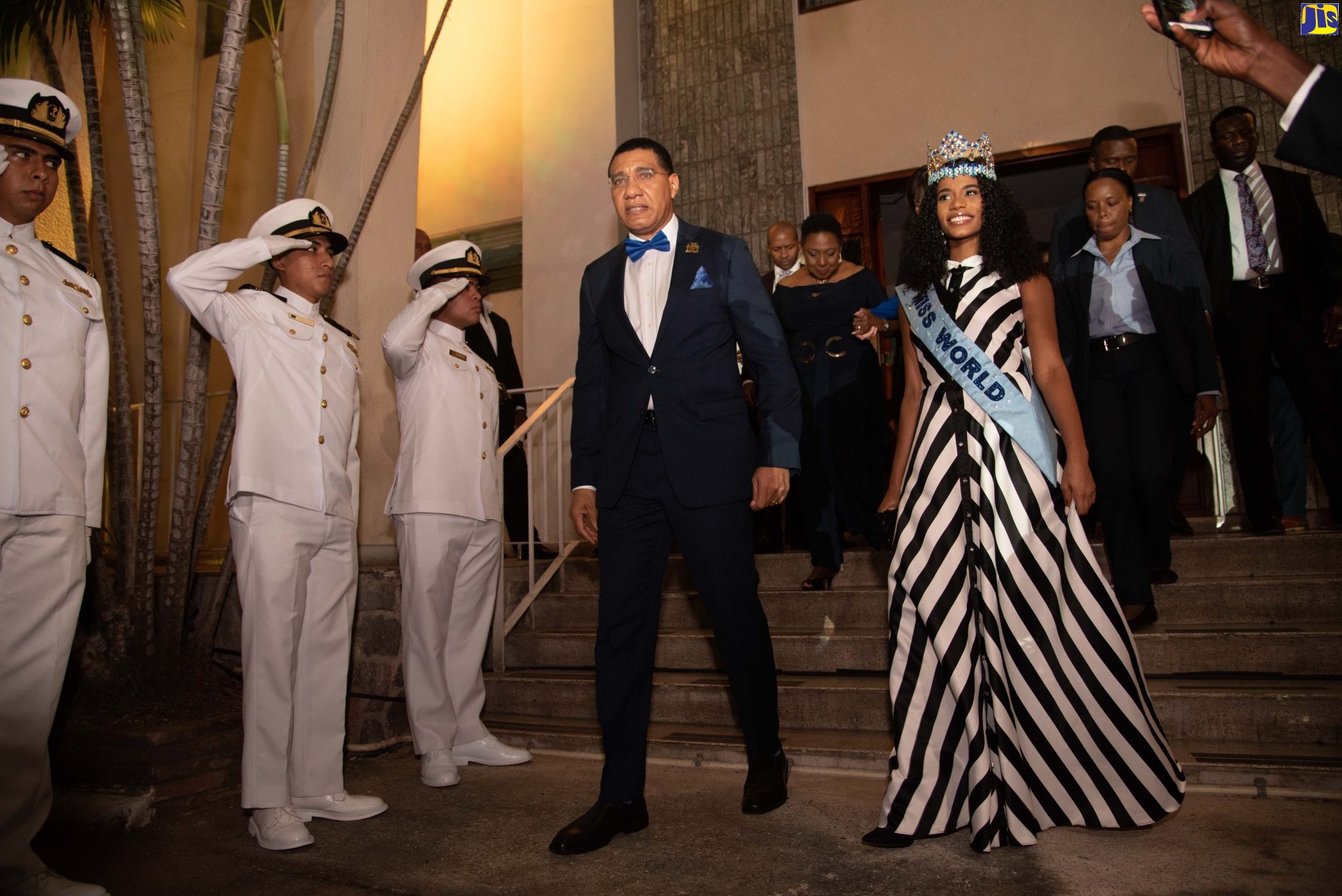 Prime Minister, the Most Hon. Andrew fourth left), escorts Miss World 2019, Toni-Ann Singh, to the lawns of Jamaica House for Sunday’s (December 22) reception, hosted in her honour. The event was part of the four-day visit by Miss Singh, who copped the title in London, on December 14. Behind the Prime Minister is Minister of Culture, Gender, Entertainment and Sport, Hon. Olivia Grange.