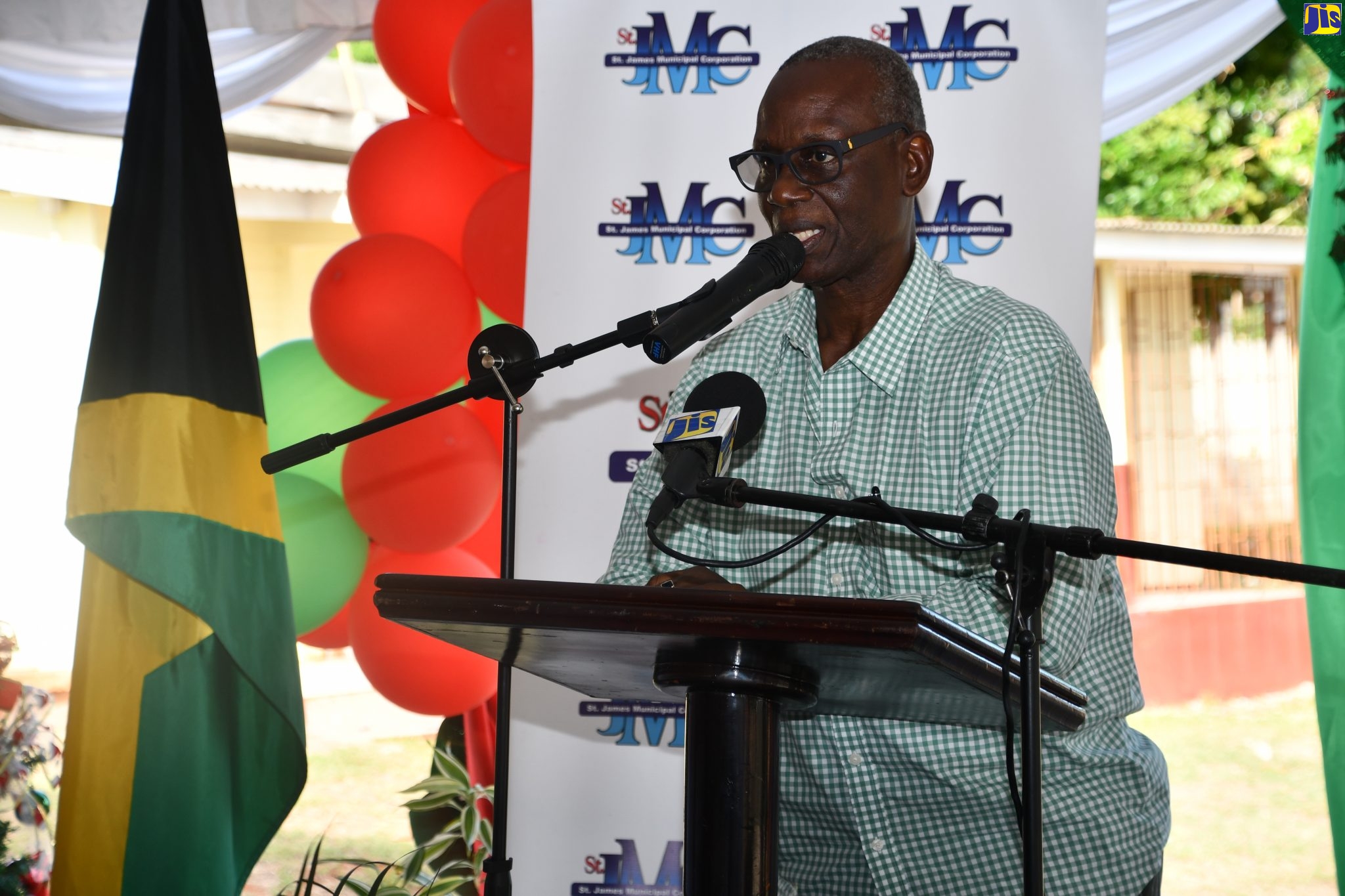 Minister of Local Government and Community Development , Hon. Desmond McKenzie, addresses staff and residents of the St. James Infirmary, during the Ministry’s Christmas Dinner at the institution on Friday (December 13).