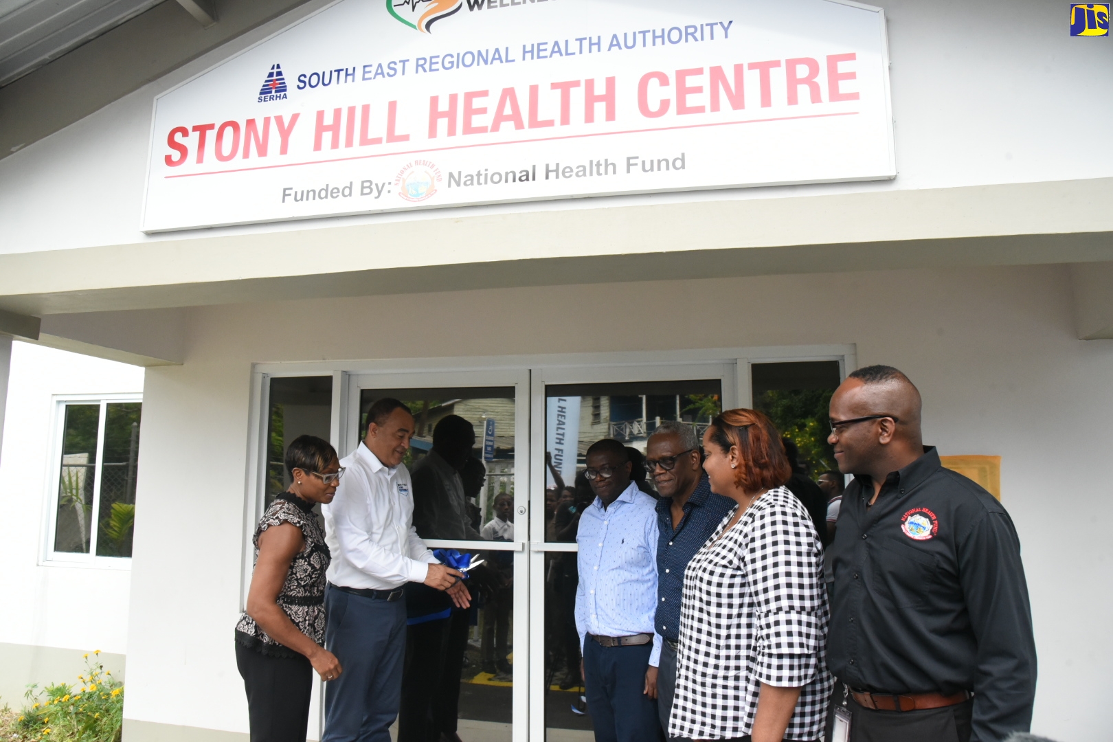 Minister of Health and Wellness, Dr. the Hon. Christopher Tufton (2nd left), cuts the ribbon to reopen the Stony Hill Health Centre, St. Andrew, on December 6. Sharing the moment (from left) are: Member of Parliament for West Rural St. Andrew, Juliet Cuthbert-Flynn; Chief Executive Officer of the National Health Fund (NHF), Everton Anderson; Chairman of the Southeast Regional Health Authority, Wentworth Charles; Medical Officer of Health at the Stony Hill Health Centre, Dr. Clivia Baird-Chin; and Acting Director of Pharmacy Services at the NHF, Ainsley Jones.