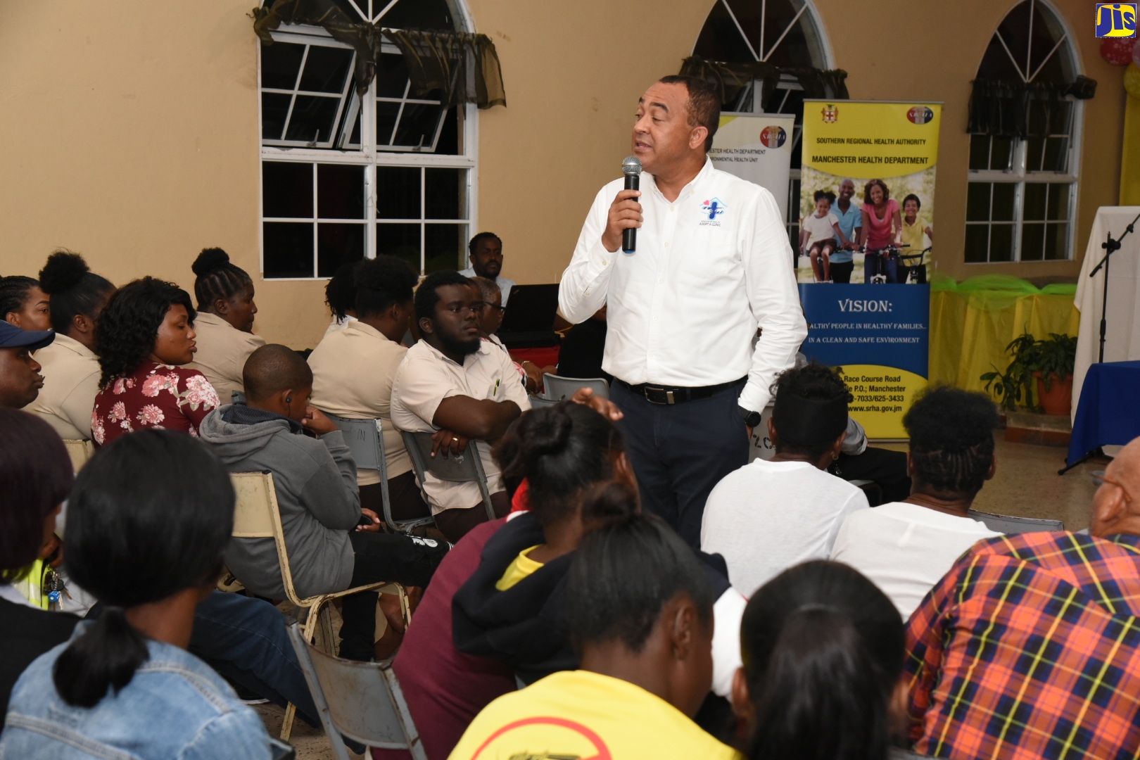 Health and Wellness Minister, Dr. the Hon Christopher Tufton, addressing a town hall at the Zorn Moravian Church in Christiana, Manchester, on December 9.