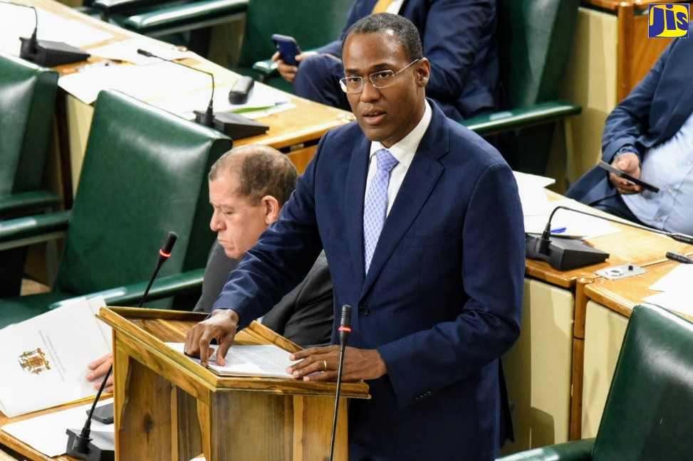 Minister of Finance and the Public Service, Dr. the Hon. Nigel Clarke, addresses the House of Representatives on December 10.