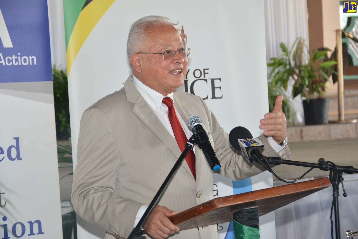Minister of Justice, Hon. Delroy Chuck, speaks at a Child Diversion Sensitisation Session, held at Glistening Waters Hotel and Attractions, in Falmouth, Trelawny, on December 6.