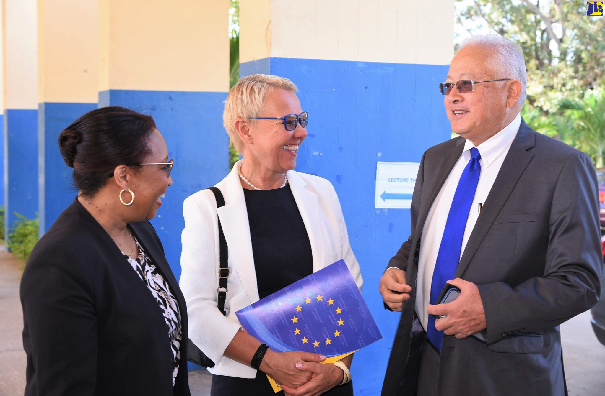 Justice Minister, Hon. Delroy Chuck (right), in discussion with (from left) Chief Technical Director in the Justice Ministry, Grace Ann Stewart, and Head of the European Union (EU) Delegation to Jamaica, Ambassador Malgorzata Wasilewska, during a Justice of the Peace (JP) sensitisation session at the National Police College of Jamaica, in Twickenham Park, St. Catherine, on Wednesday (December 11).