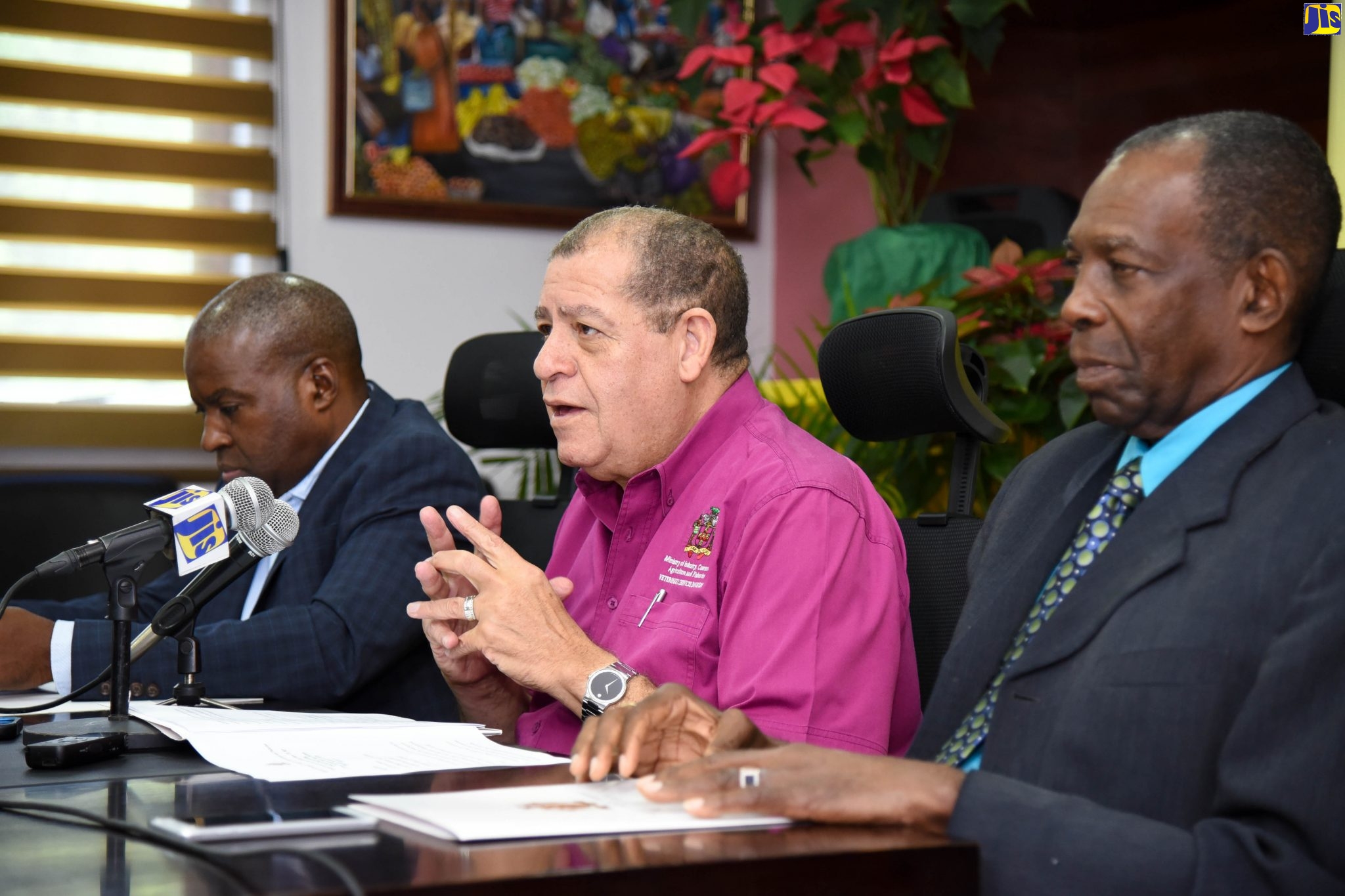 Minister of Industry, Commerce, Agriculture and Fisheries, Hon. Audley Shaw (centre), addressing the quarterly press briefing on Thursday (December 5), at the Ministry