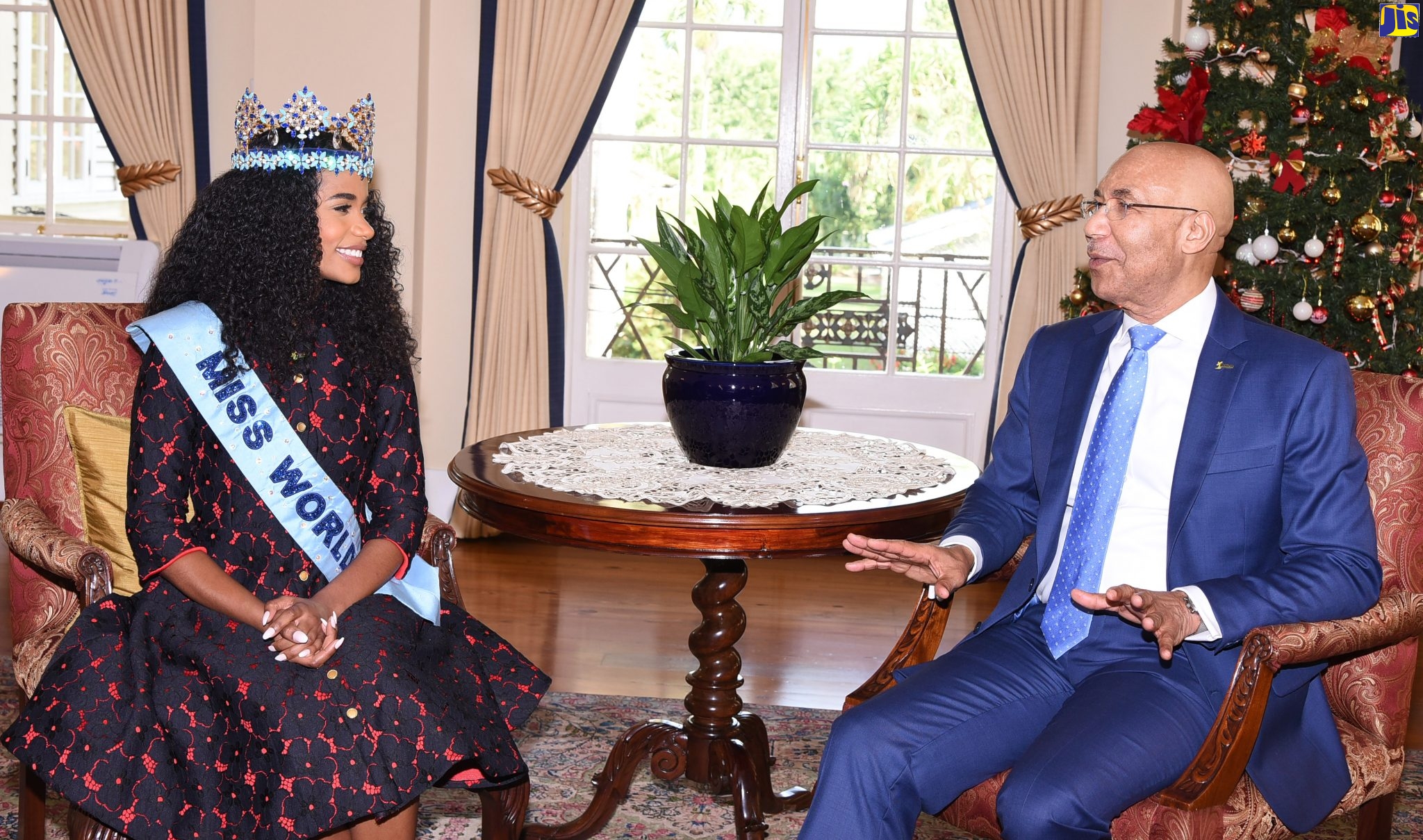 Governor-General, His Excellency the Most Hon. Sir Patrick Allen (right), in conversation with Miss World 2019, Toni-Ann Singh, when she called at King’s House, today (December 23).