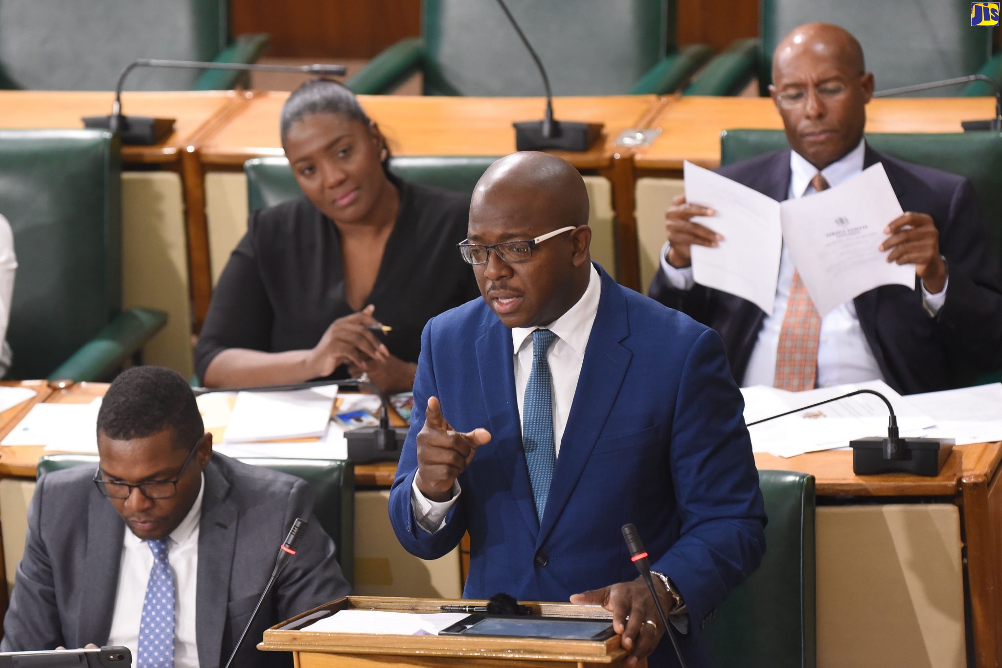 Leader of Government Business in the Senate, Pearnel Charles Jnr., emphasises a point in the Senate, on Friday (December 6). To his right is Senator Robert Morgan and in the background are Senators Aubyn Hill and Kerensia Morrison.