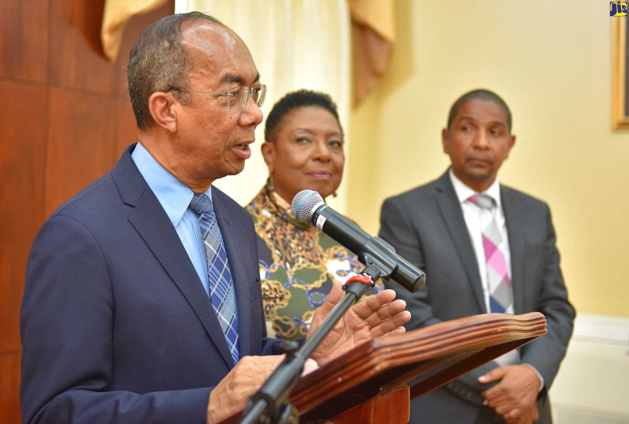 Minister of National Security, Hon. Dr. Horace Chang (left), fields questions from journalists during a press conference convened at Jamaica House on Wednesday (December 11), to discuss the Noise Abatement (Temporary Amendment) Act, which was passed in the House of Representatives on Tuesday (December 10). Also pictured (from second left) are Minister of Culture, Gender, Entertainment and Sport, Hon. Olivia Grange; and Mayor of Kingston, Senator Councillor Delroy Williams.
