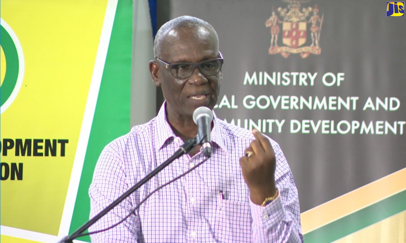 Minister of Local Government and Community Development, Hon. Desmond McKenzie, addresses town hall meeting at the Trelawny Municipal Corporation on December 12.